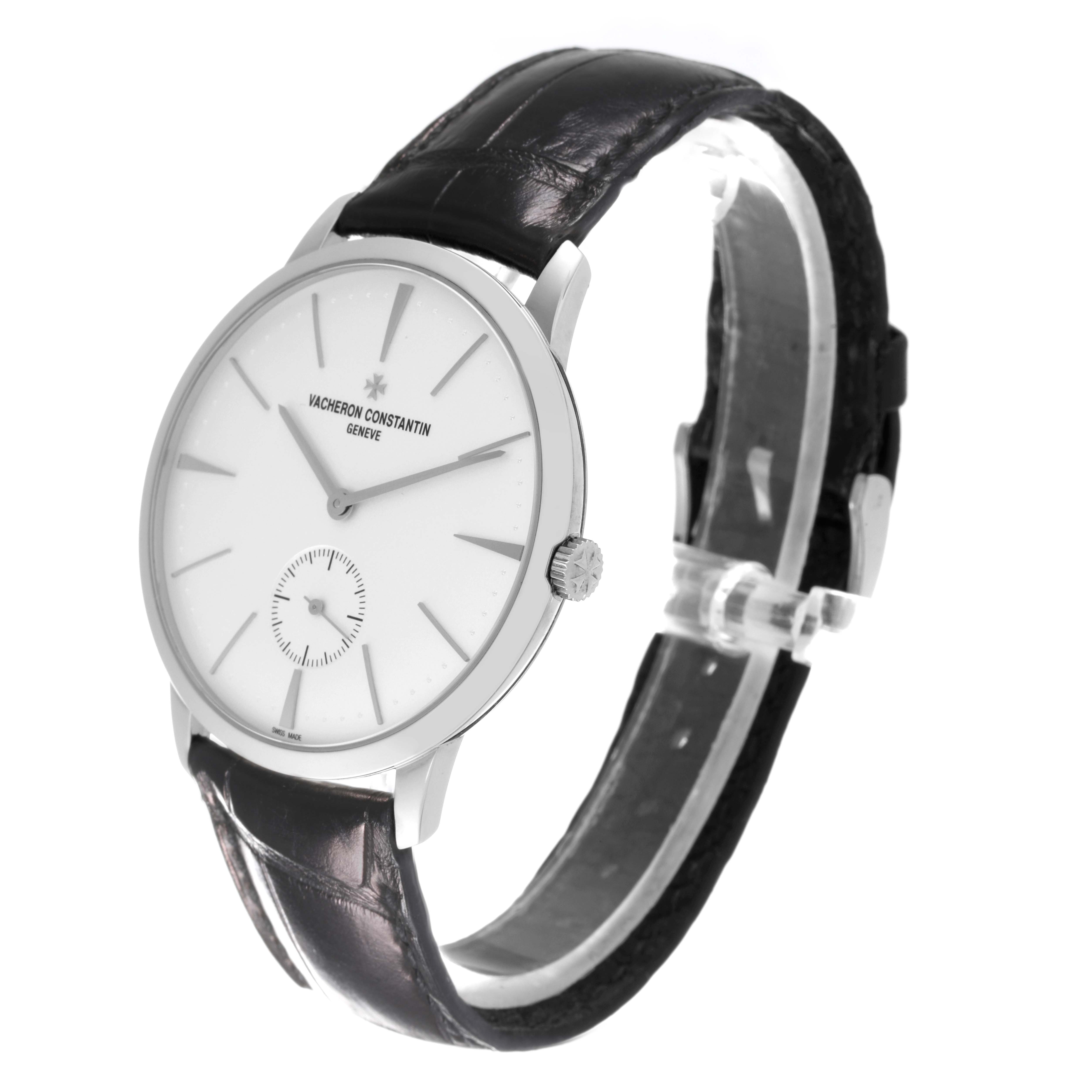 The Vacheron Constantin Patrimony 1110U/000G-B086 Men's White Gold Silver Dial 1110U/000G-B086 Men's White Gold Silver Dial watch is shown at an angle that highlights the face, crown, and leather strap.