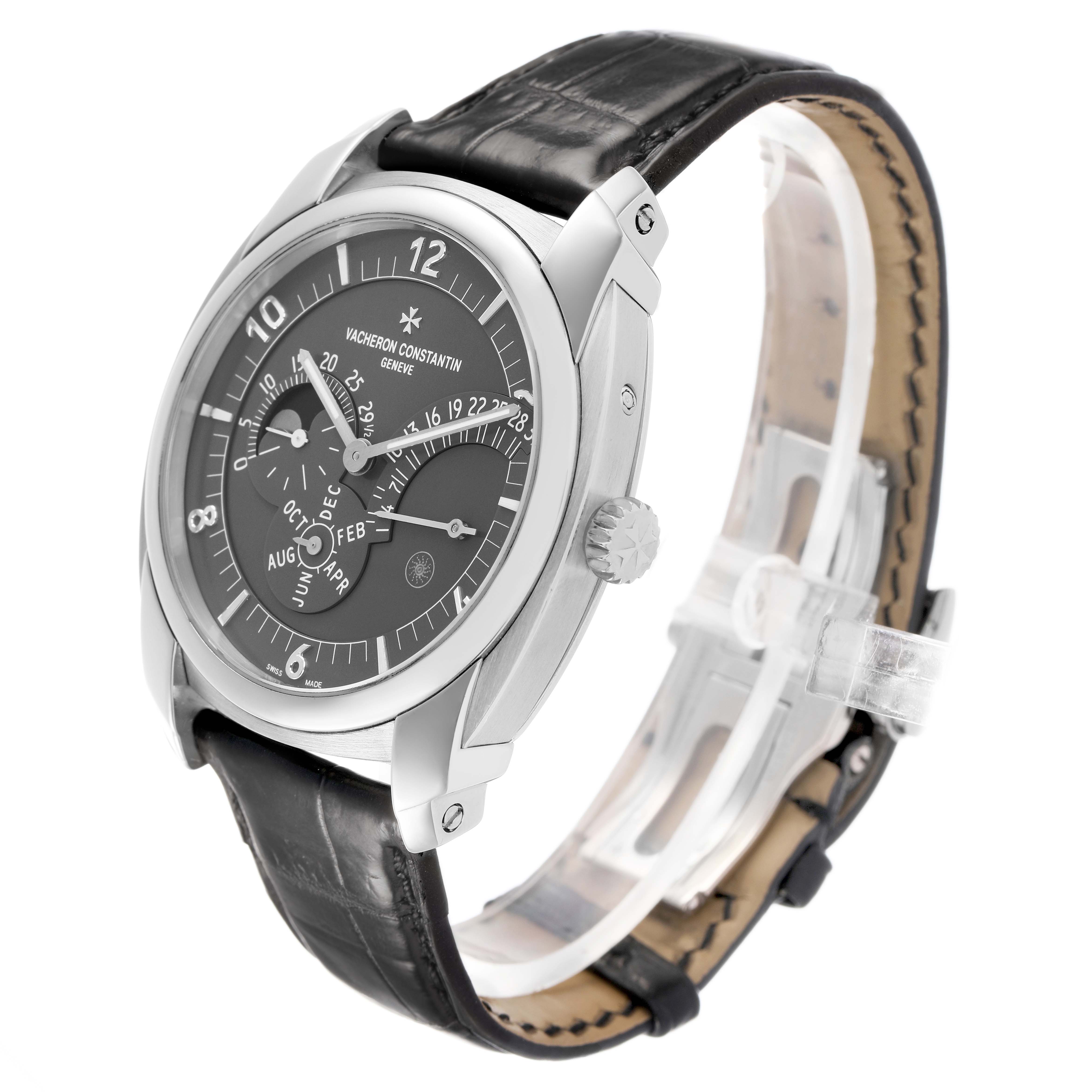 The Vacheron Constantin Quai de L'île watch is shown at a three-quarter angle, highlighting the dial, bezel, crown, and strap.