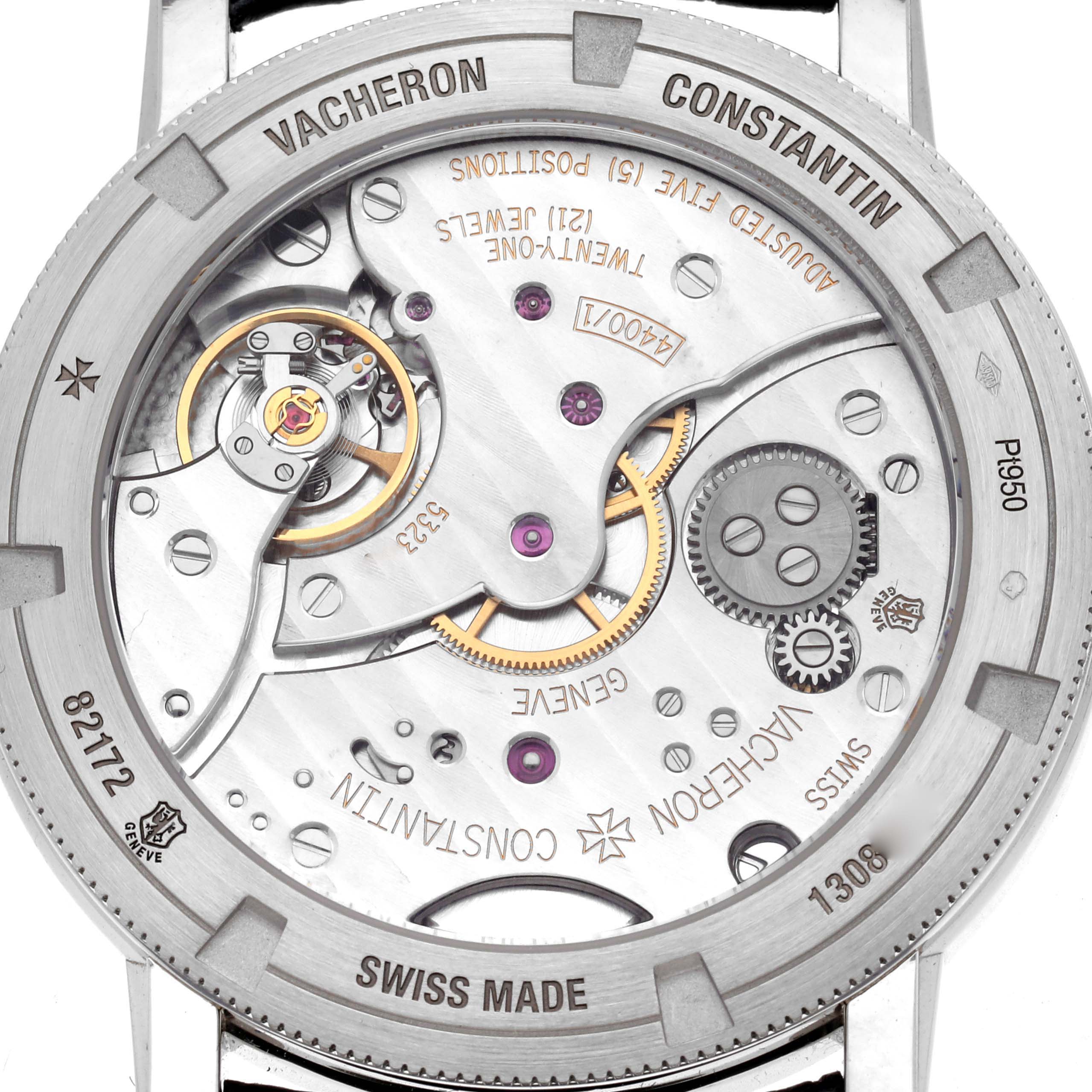 The image shows the back view of a Vacheron Constantin Traditionnelle 82172 Men
s Platinum Grey Dial watch, highlighting its intricate movement and components.