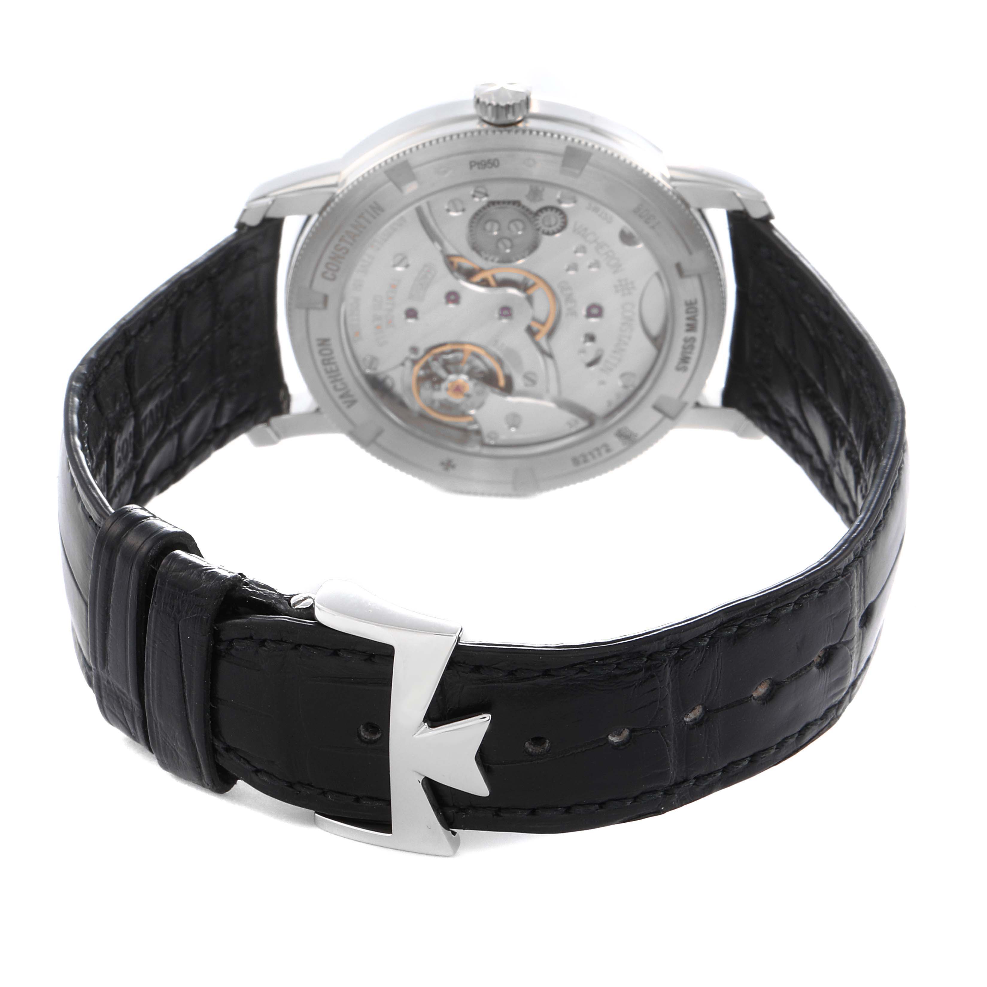 The Vacheron Constantin Traditionnelle 82172 Men
s Platinum Grey Dial watch is shown from the back, highlighting the movement and black leather strap with a clasp.