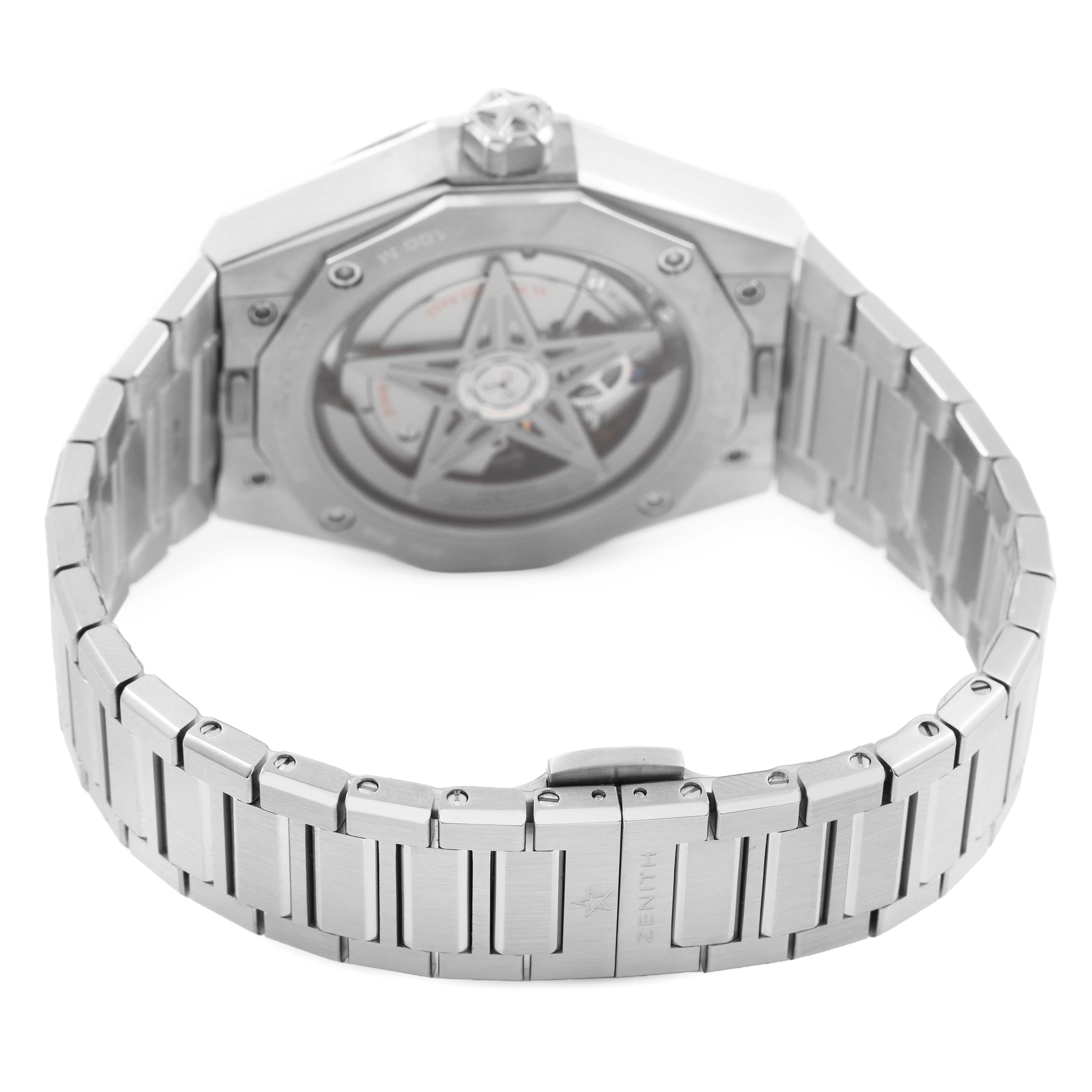 The image shows the back view of a Zenith Defy 03.9300.3620 / 51.I001 Men's Stainless Steel Blue Dial watch, highlighting the case back and part of the bracelet.