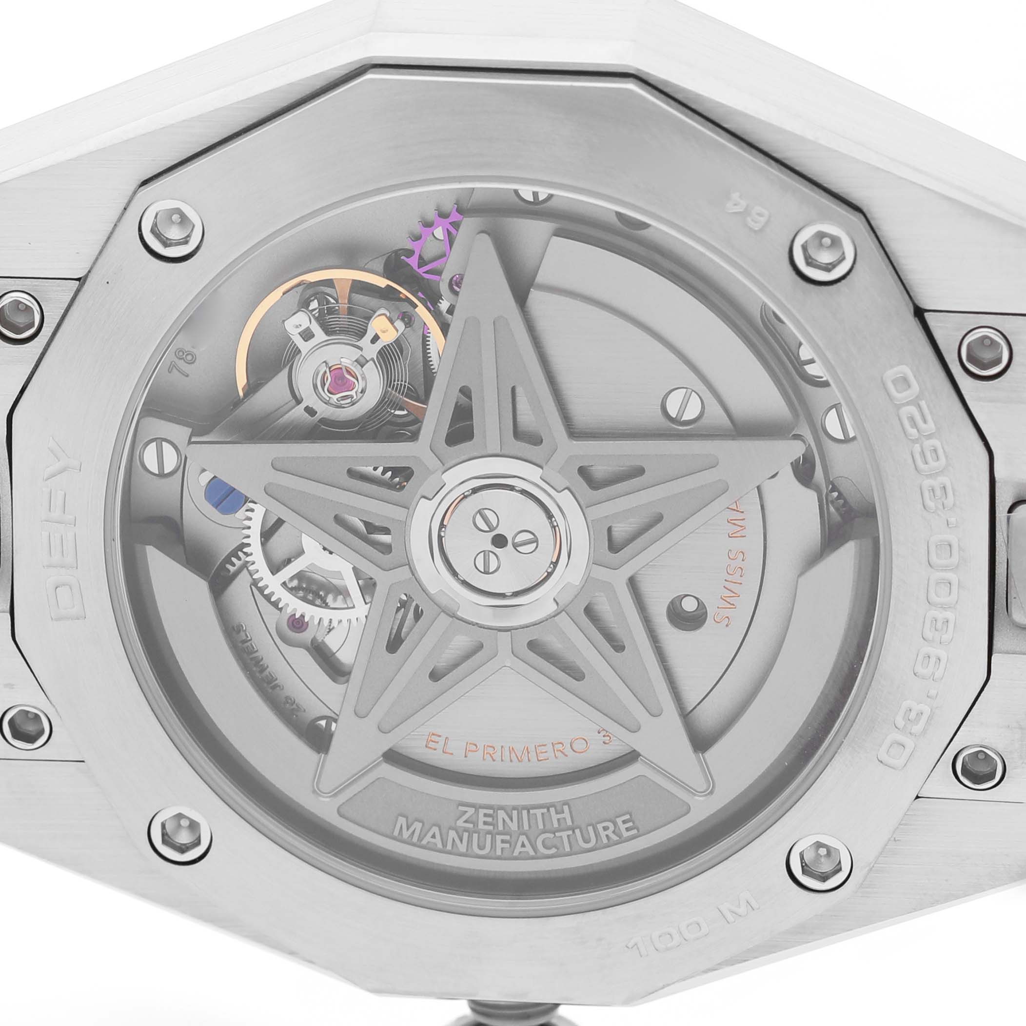 The image shows the back of the Zenith Defy 03.9300.3620 / 51.I001 Men's Stainless Steel Blue Dial watch, highlighting its movement and star-shaped rotor.