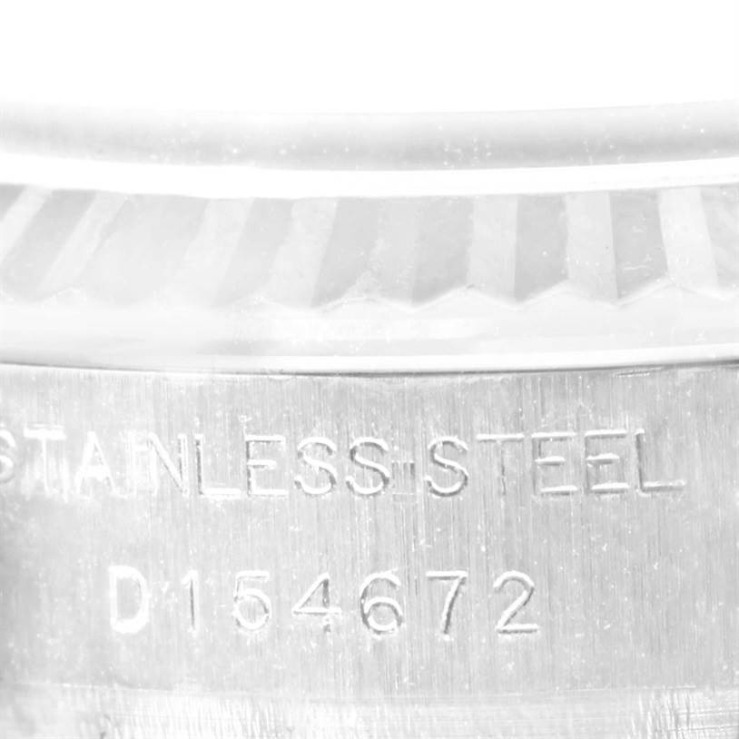 The image shows a close-up of the stainless steel band and part of the bezel of the Rolex 179174 Women's Stainless Steel Blue Dial 179174 Women's Stainless Steel Blue Dial Datejust Steel White Gold Vignette Diamond Dial Watch 179174.