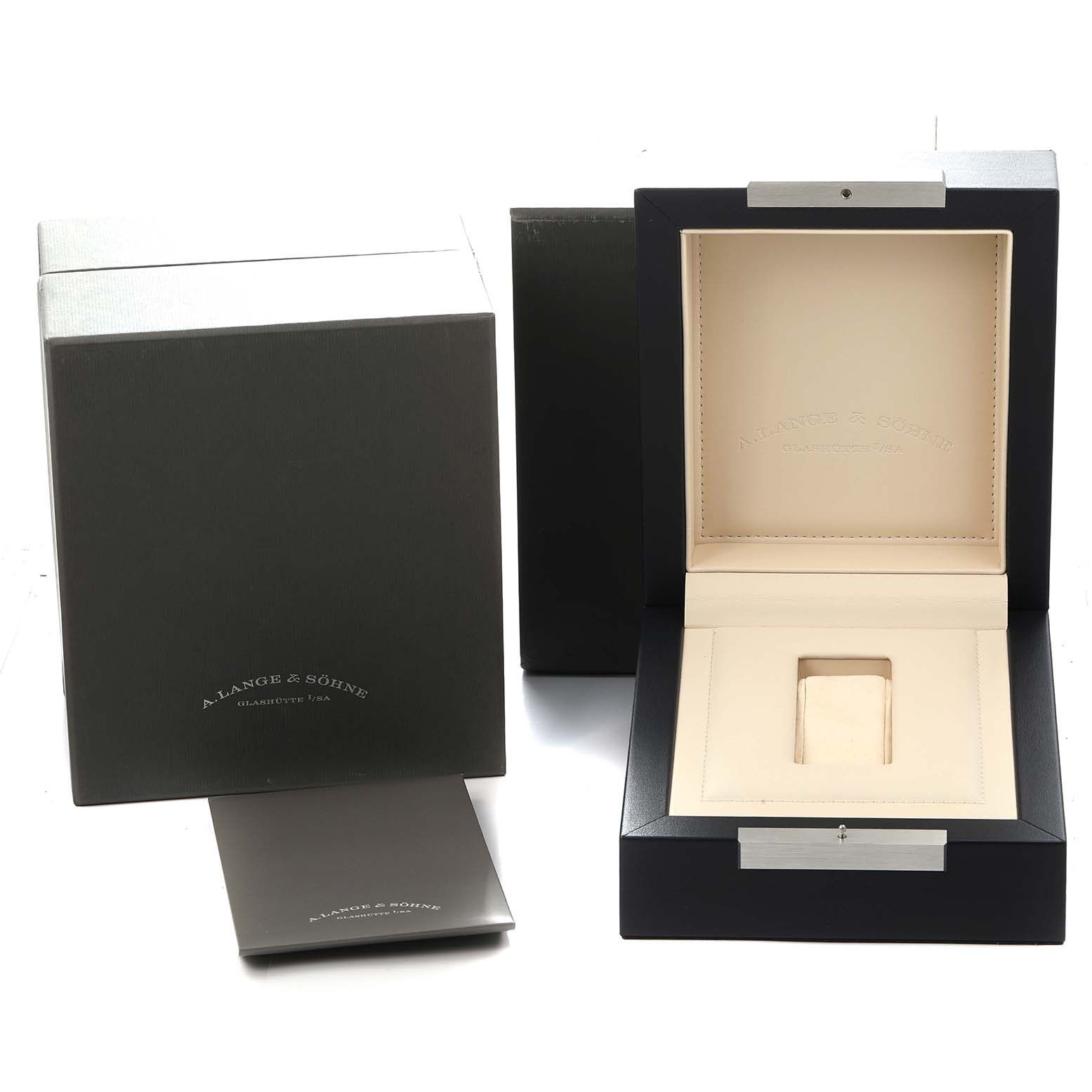 The image shows the packaging and presentation box for a Saxonia model by A. Lange 
Söhne, including an outer box and a manual.
