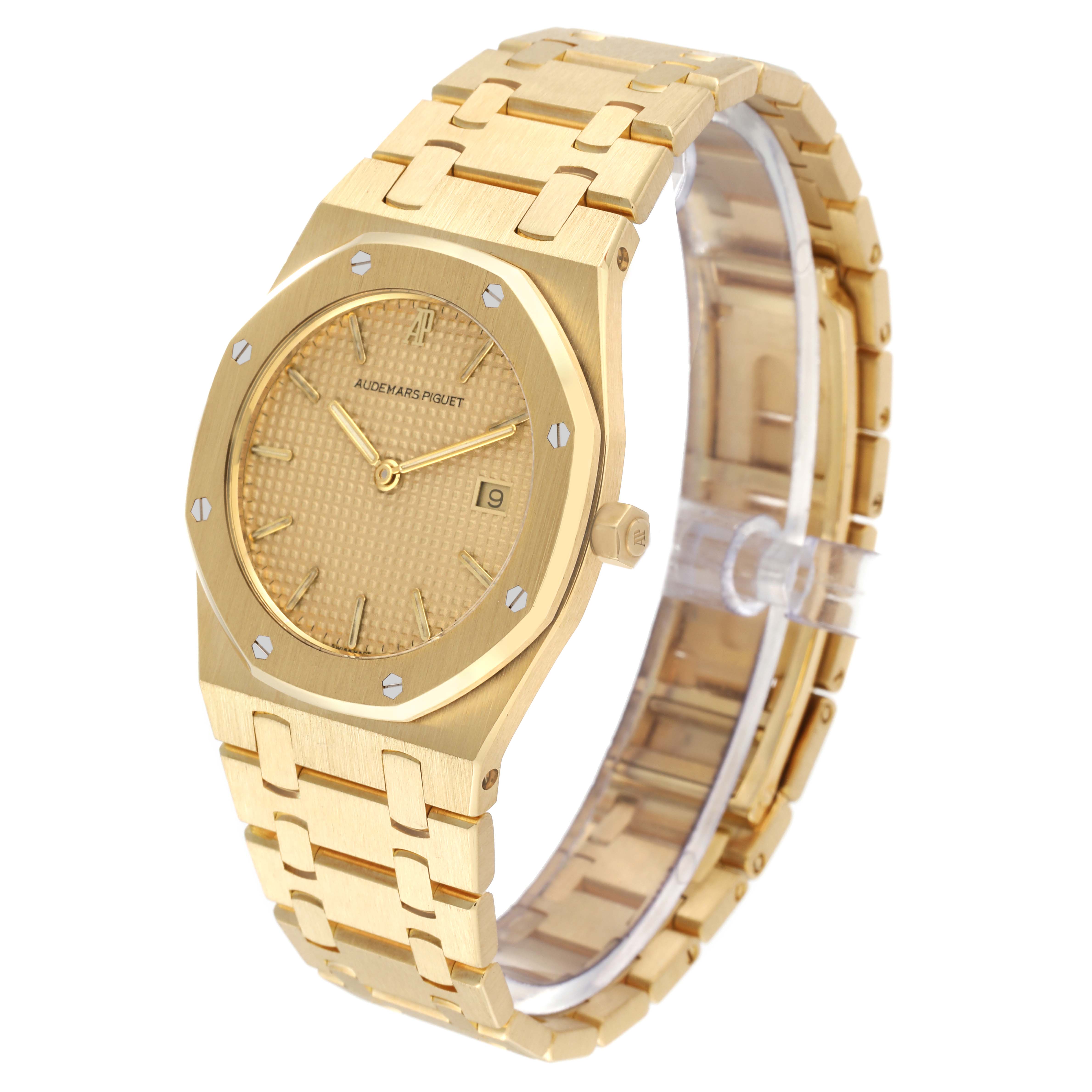 This image shows an angled view of the Audemars Piguet Royal Oak 56303 Men's Yellow Gold Champagne Dial 56303 Men's Yellow Gold Champagne Dial watch, highlighting its gold bracelet and dial.