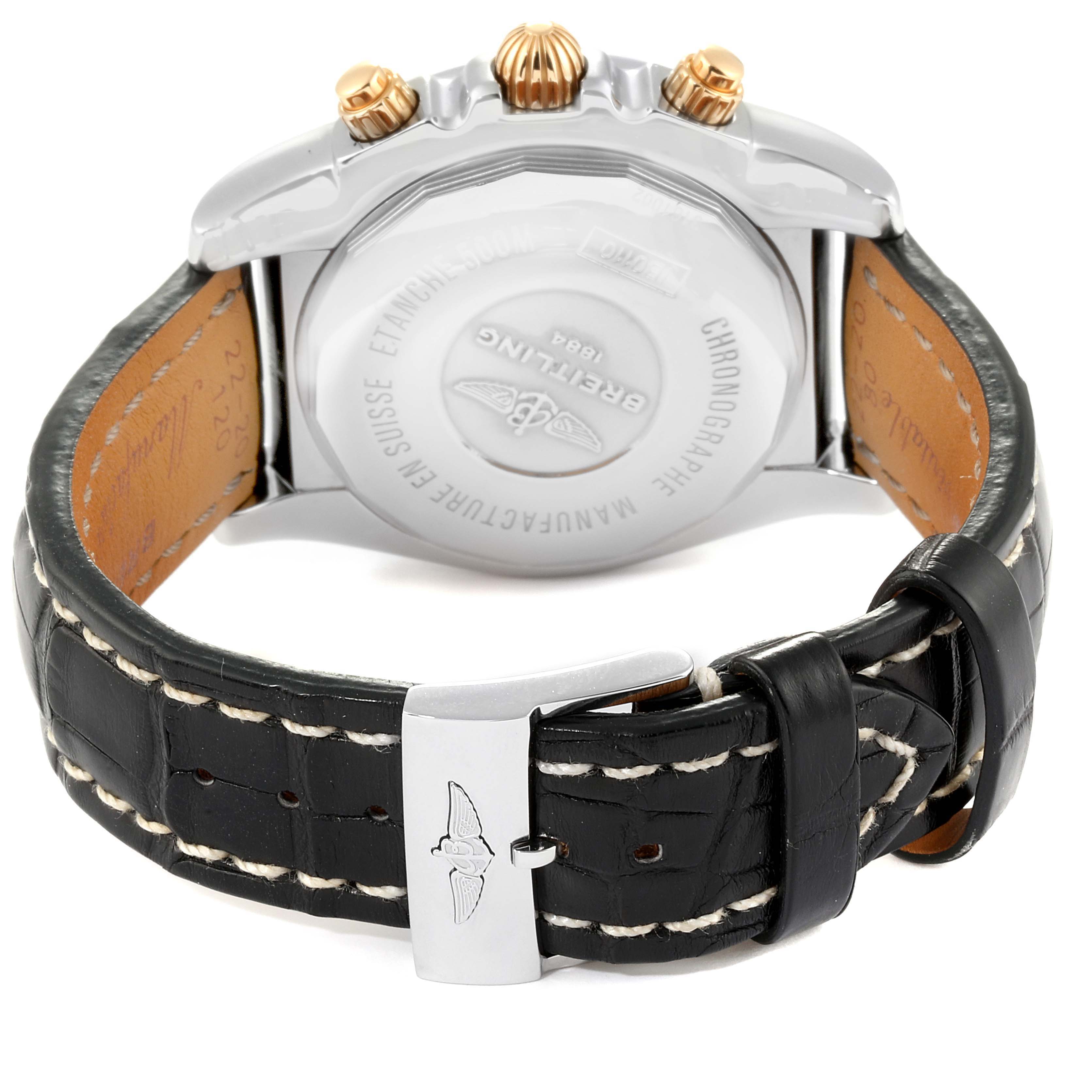 The image shows the back and side of the Breitling Chronomat IB0110 Men's Steel and Gold (two tone) Blue Dial IB0110 Men's Steel and Gold (two tone) Blue Dial watch, focusing on the case back, crown, pushers, and leather strap.