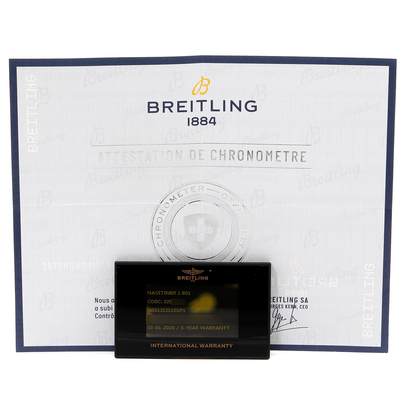 The image displays a warranty card and certificate for the Breitling Navitimer AB0120 Men
s Stainless Steel Silver Dial AB0120 Men
s Stainless Steel Silver Dial model, taken from a front angle.