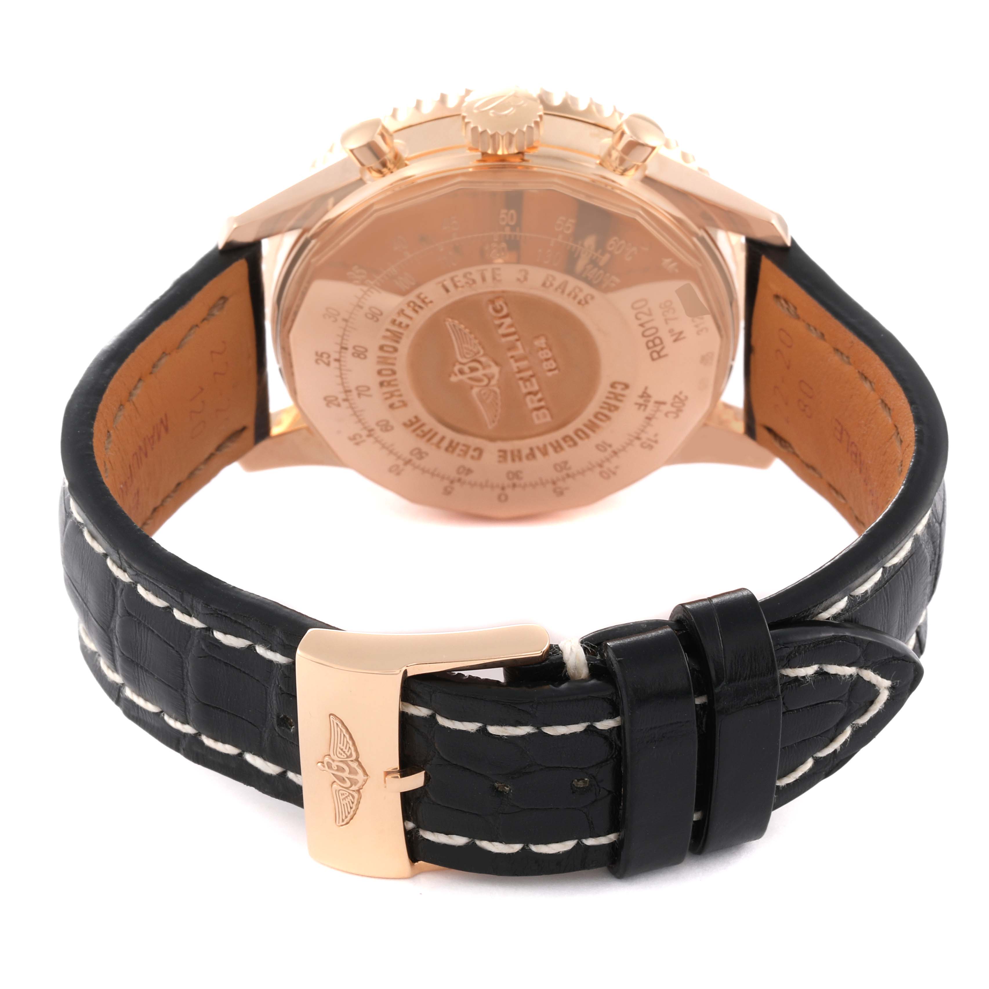 The image shows the Breitling Navitimer RB0120 Men
s Rose Gold Black Dial RB0120 Men
s Rose Gold Black Dial
s back case and leather strap from a rear angle.