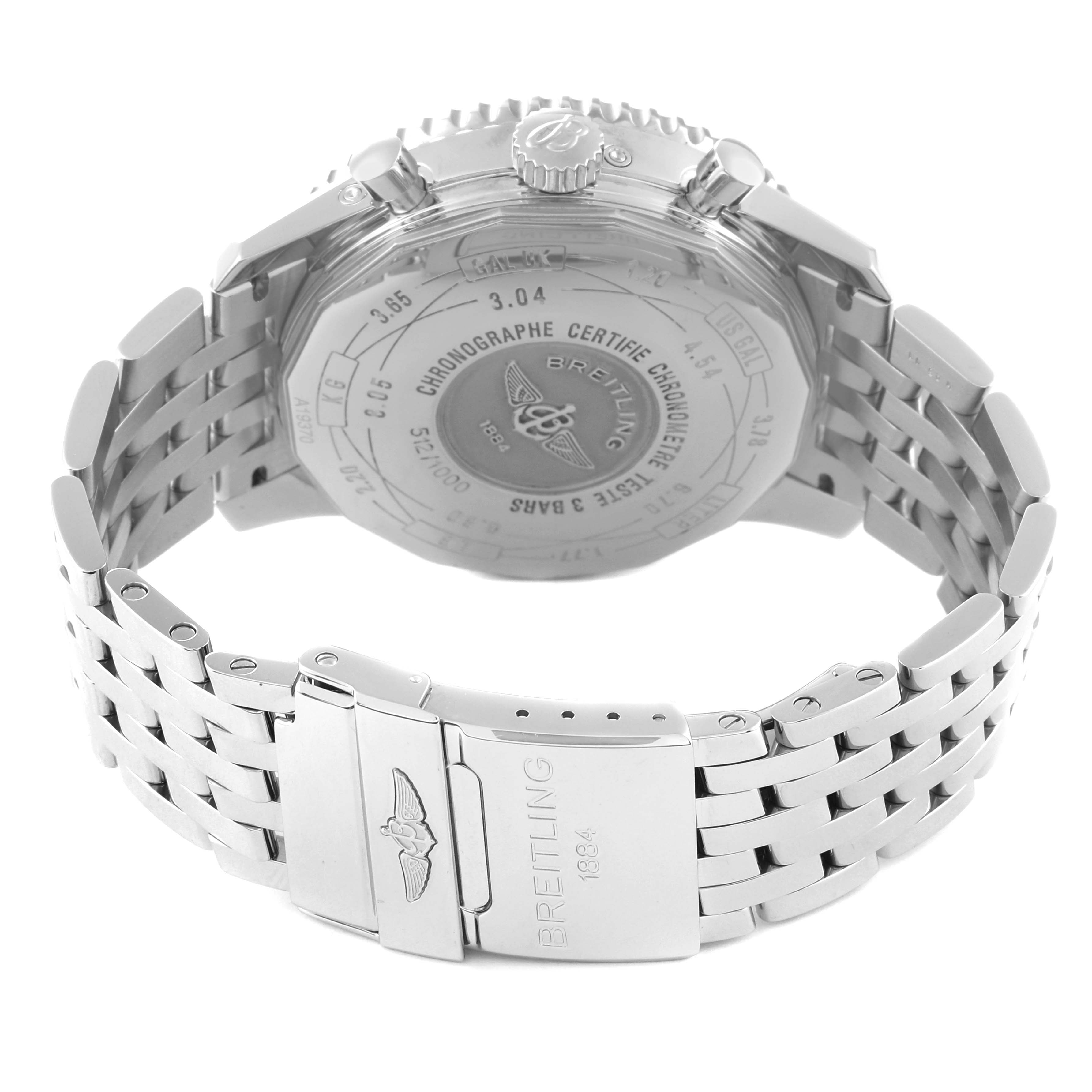 The image shows the back casing and clasp of a Breitling Limited Series model watch, featuring engravings and a stainless steel band.