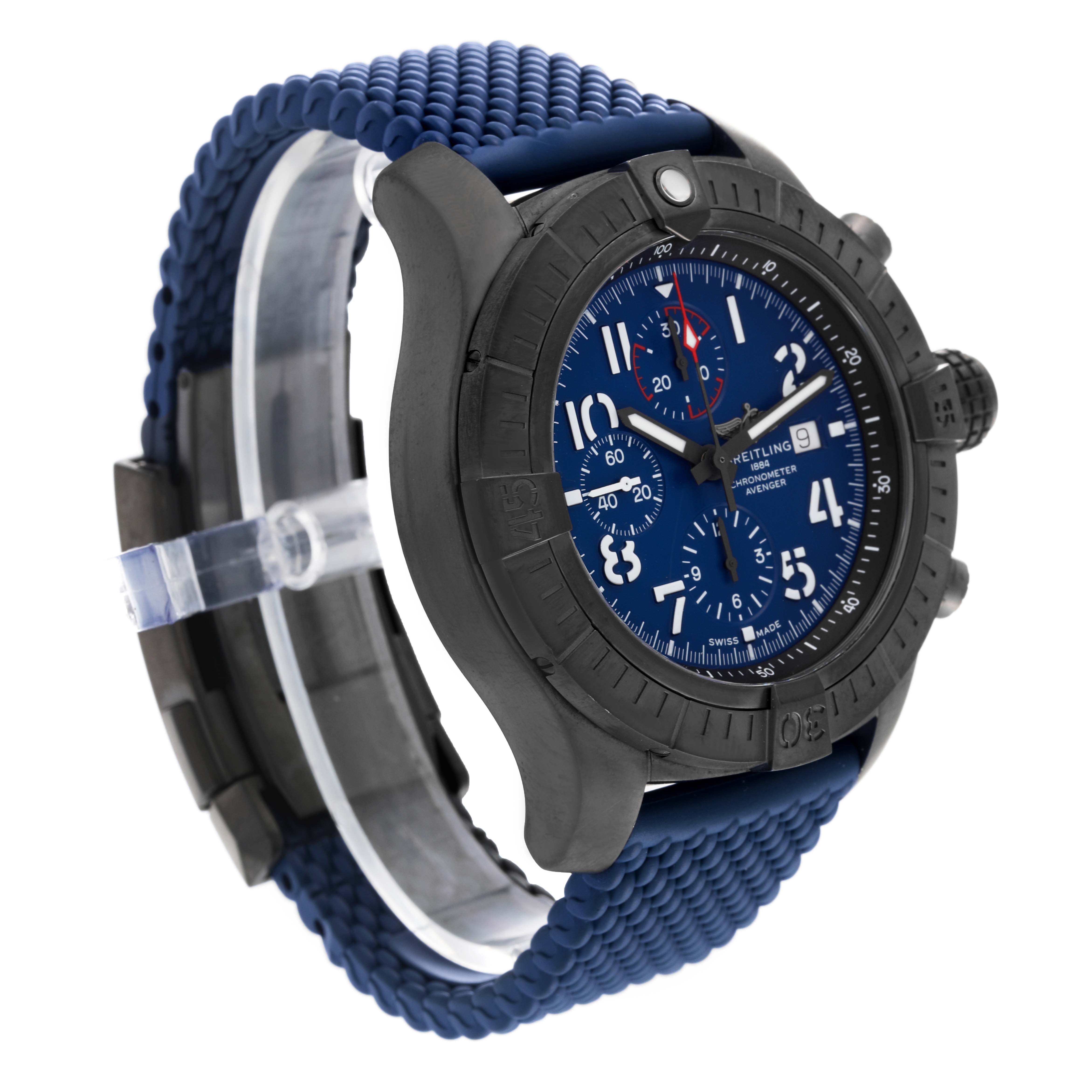 This image shows a Breitling Avenger V13375 Mens Titanium Blue Dial watch from a three-quarter side angle, highlighting its blue face, bezel, and textured strap.