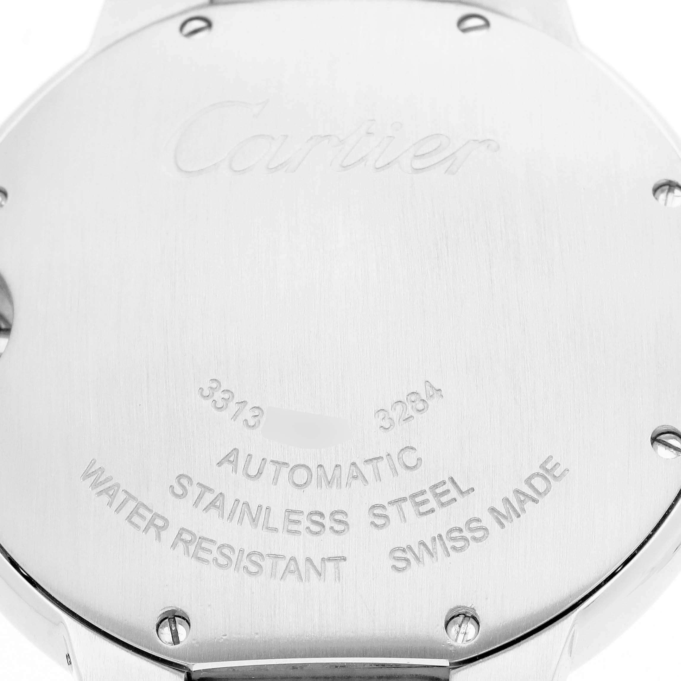 The image shows the back of a Ballon Bleu by Cartier, highlighting details like "Automatic," "Stainless Steel," and "Swiss Made."
