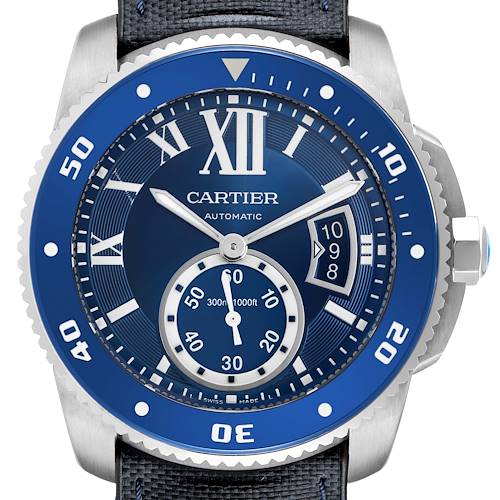 The Calibre de Cartier watch is shown from the front, displaying the dial, bezel, and crown with a focus on the blue accents.