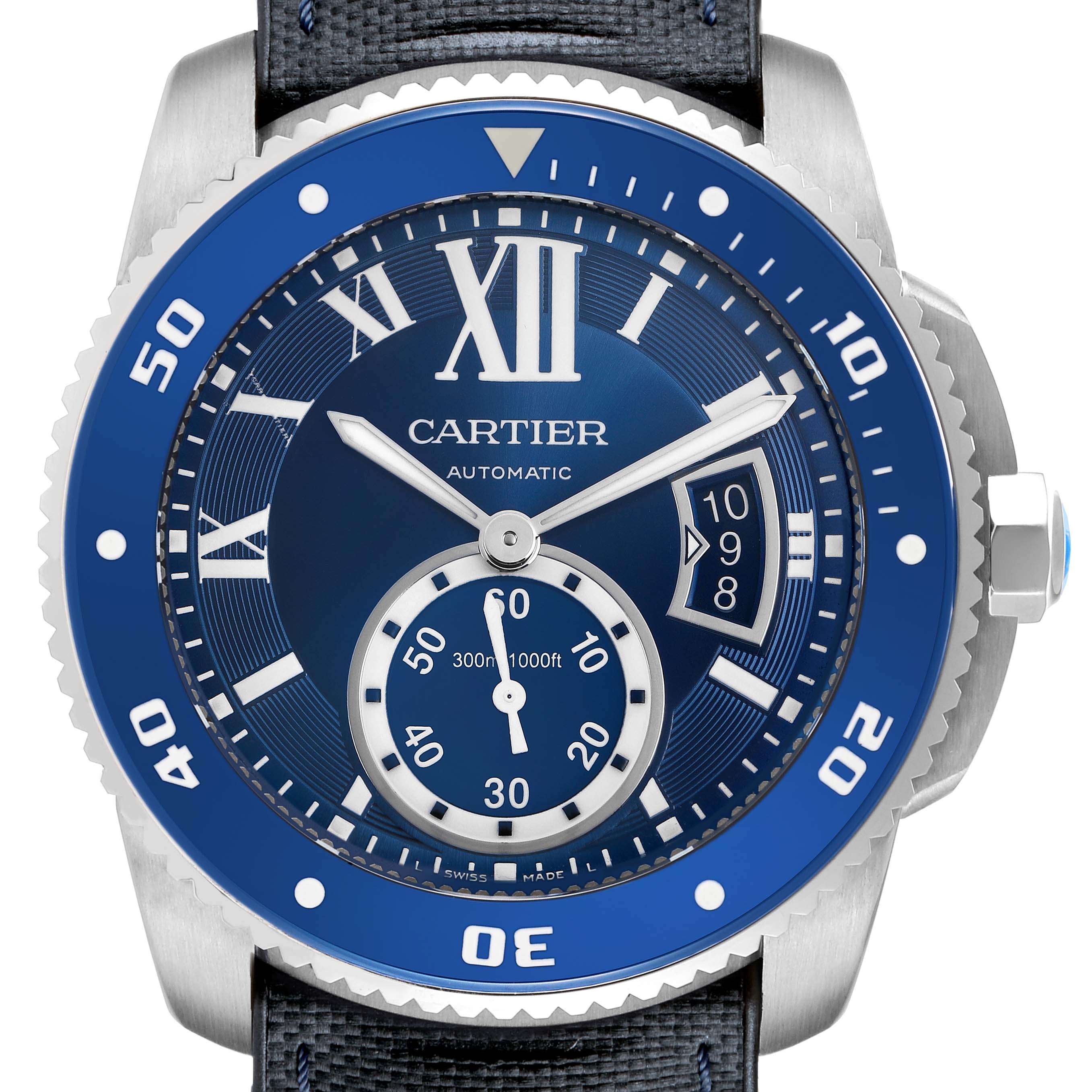 The Calibre de Cartier watch is shown from the front, highlighting the dial, hands, bezel, and crown.
