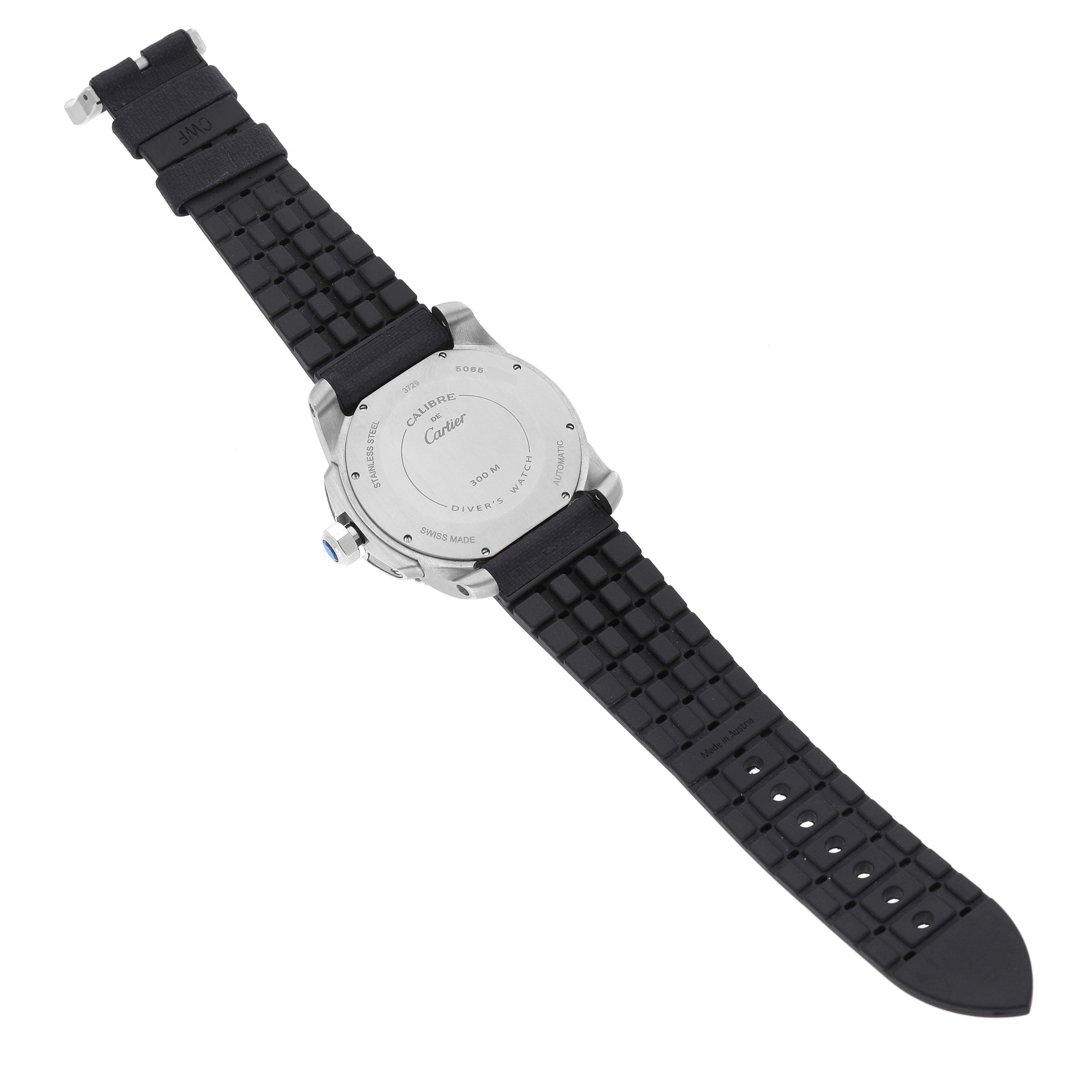 The image shows the back view of a Calibre de Cartier watch, highlighting its strap, case back, and markings.