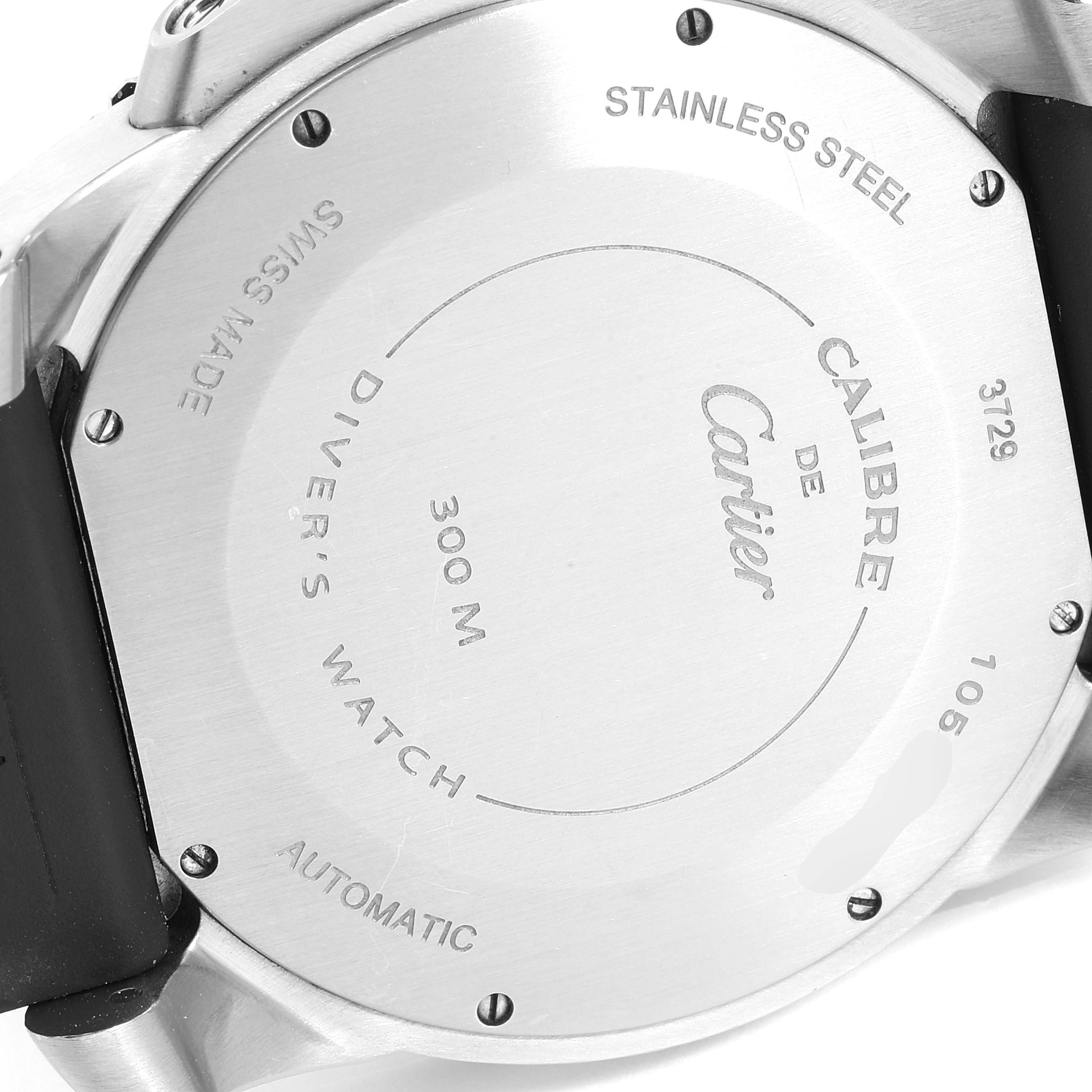 This image shows the stainless steel back case of the Calibre de Cartier watch by Cartier at an angled close-up view.
