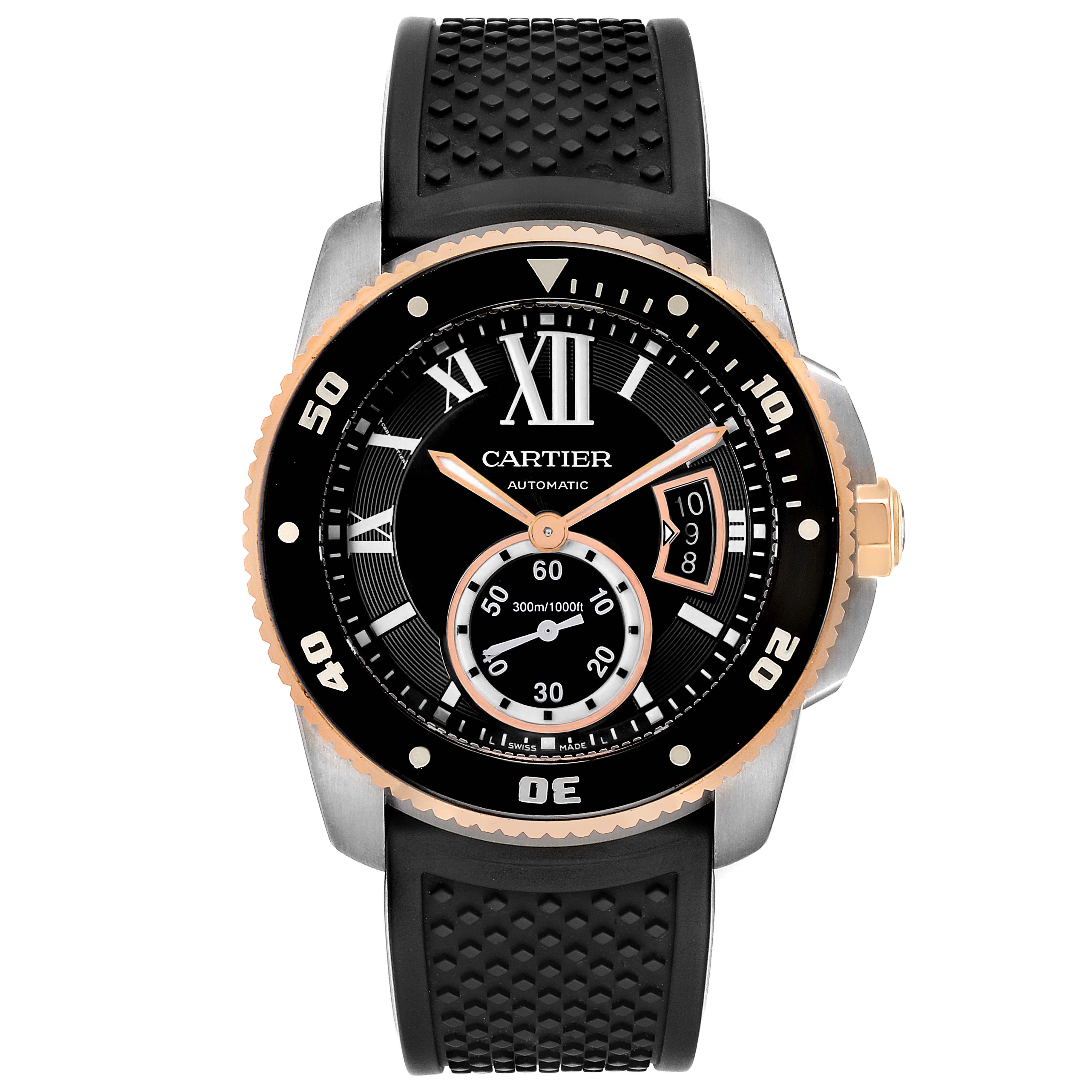 This image shows a front view of a Calibre de Cartier watch by Cartier, featuring a black dial and rubber strap.