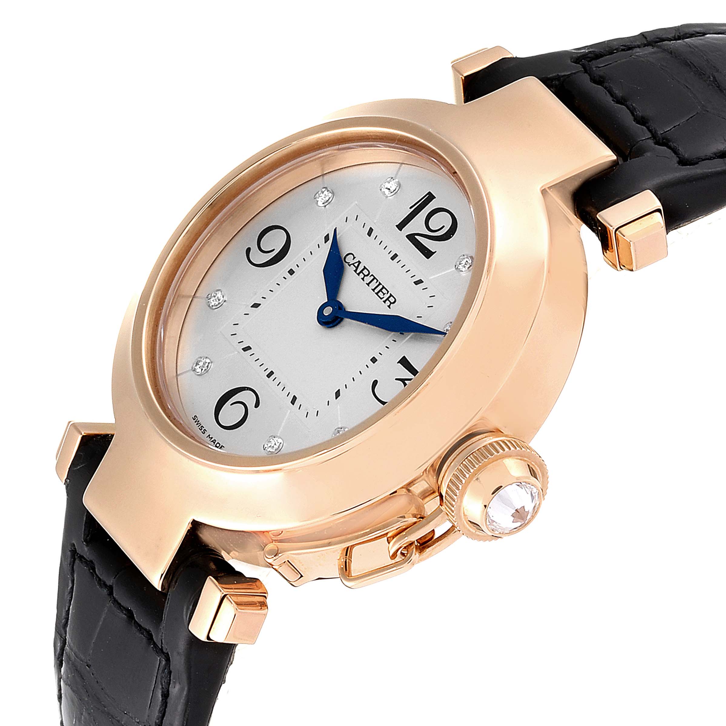 The image shows a Cartier Pasha WJ11913G Women's Rose Gold Silver Dial WJ11913G Women's Rose Gold Silver Dial model watch from an angled view, highlighting its face, crown, and black leather strap.