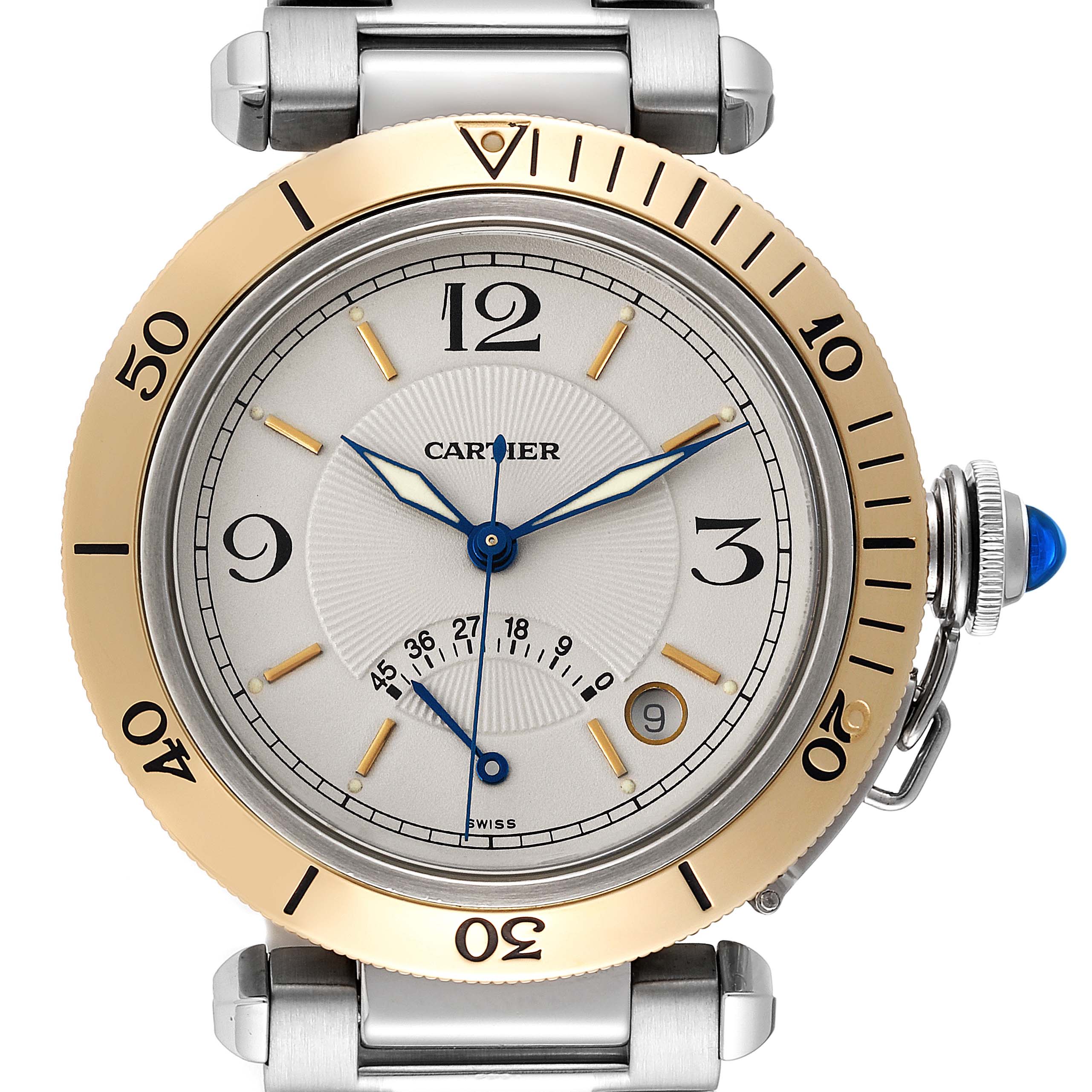 The image shows a front view of a Cartier Pasha W31012H3 Men
s Steel and Gold (two tone) Silver Dial W31012H3 Men
s Steel and Gold (two tone) Silver Dial watch, displaying its dial, bezel, hands, and crown with a blue gemstone.
