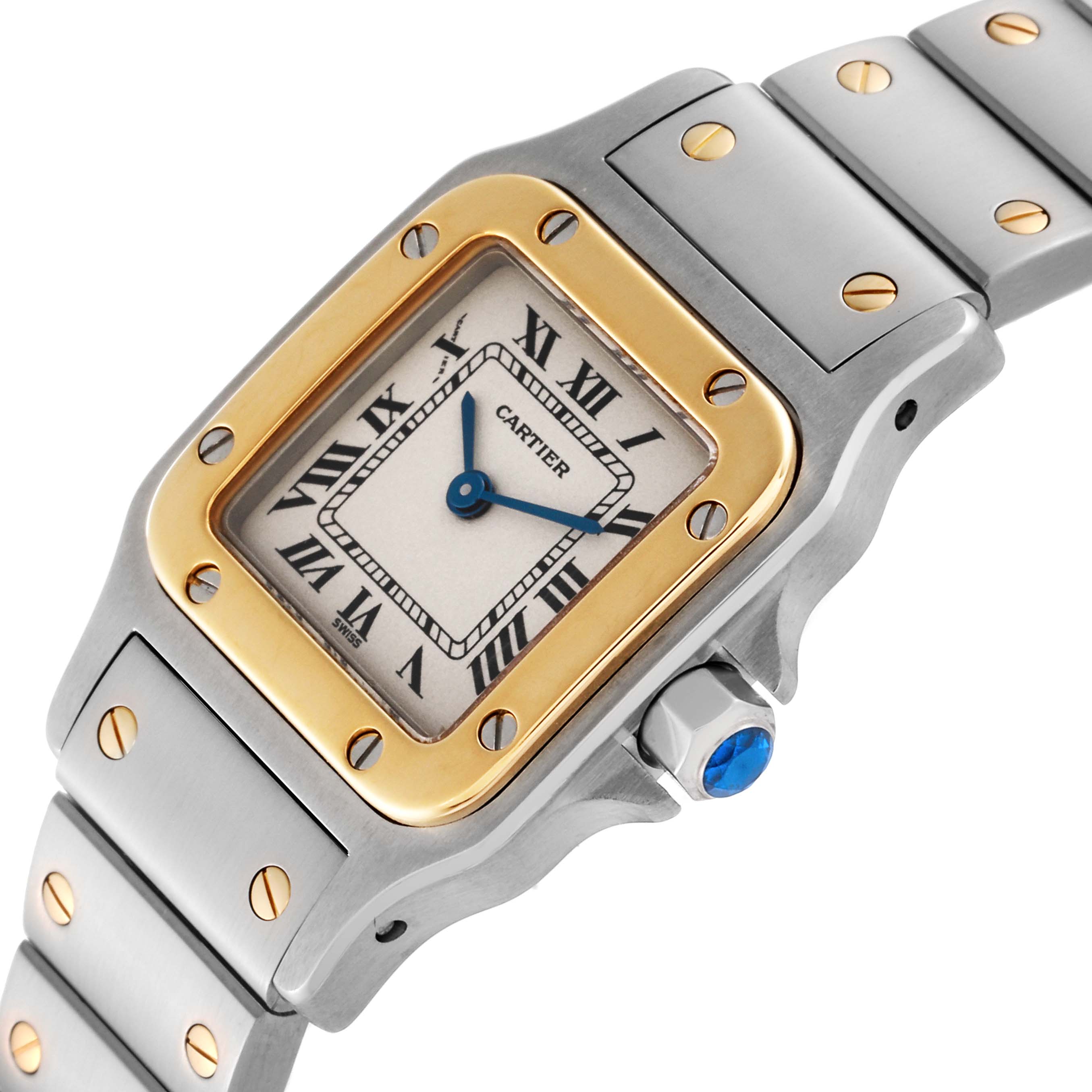 This image shows a close-up angle of the Santos de Cartier watch, focusing on the dial, bezel, crown, and part of the bracelet.