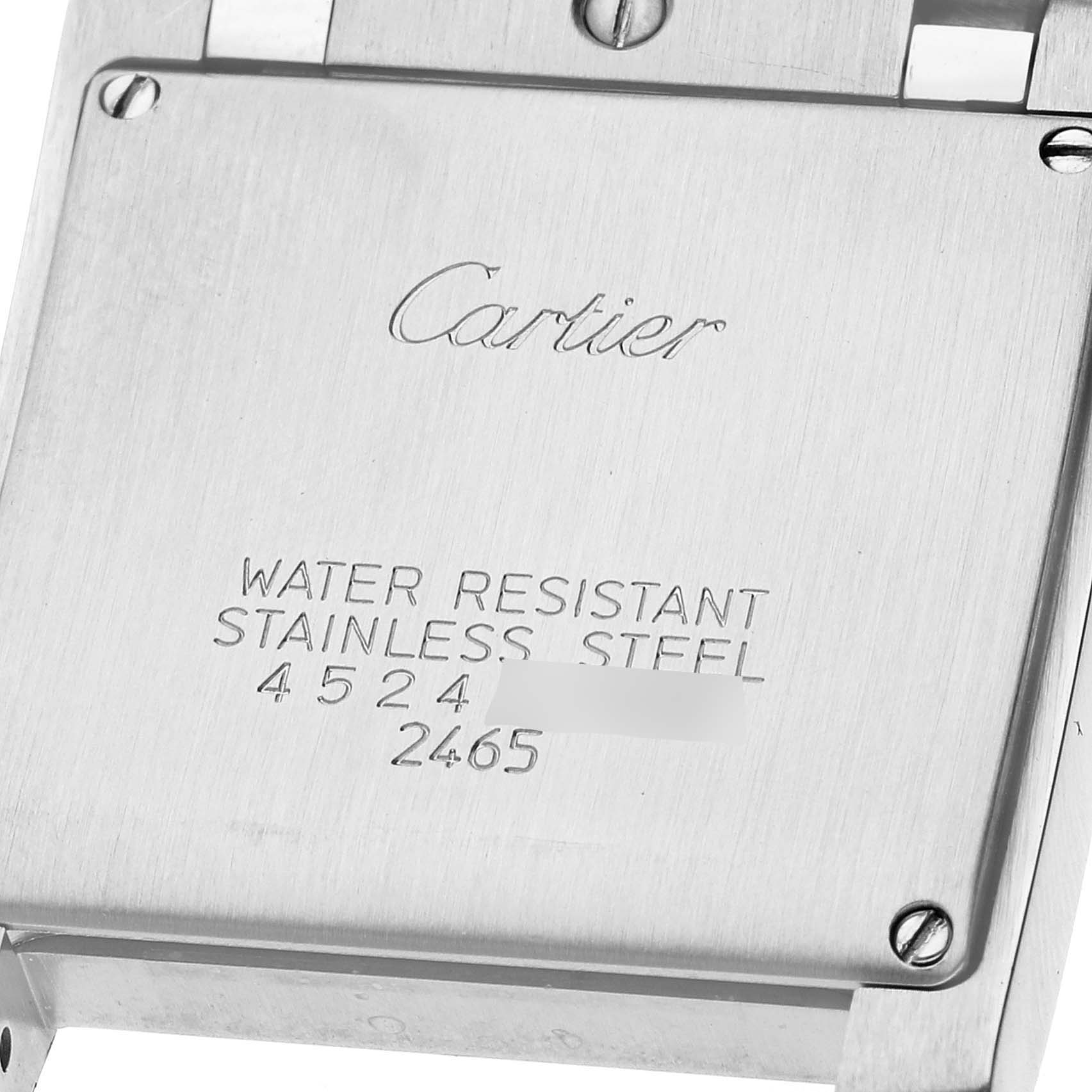 The image shows the back of a stainless steel case of a Cartier Tank Francaise W51011Q3 Women
s Stainless Steel Silver Dial W51011Q3 Women
s Stainless Steel Silver Dial watch, highlighting the water resistance and model information.