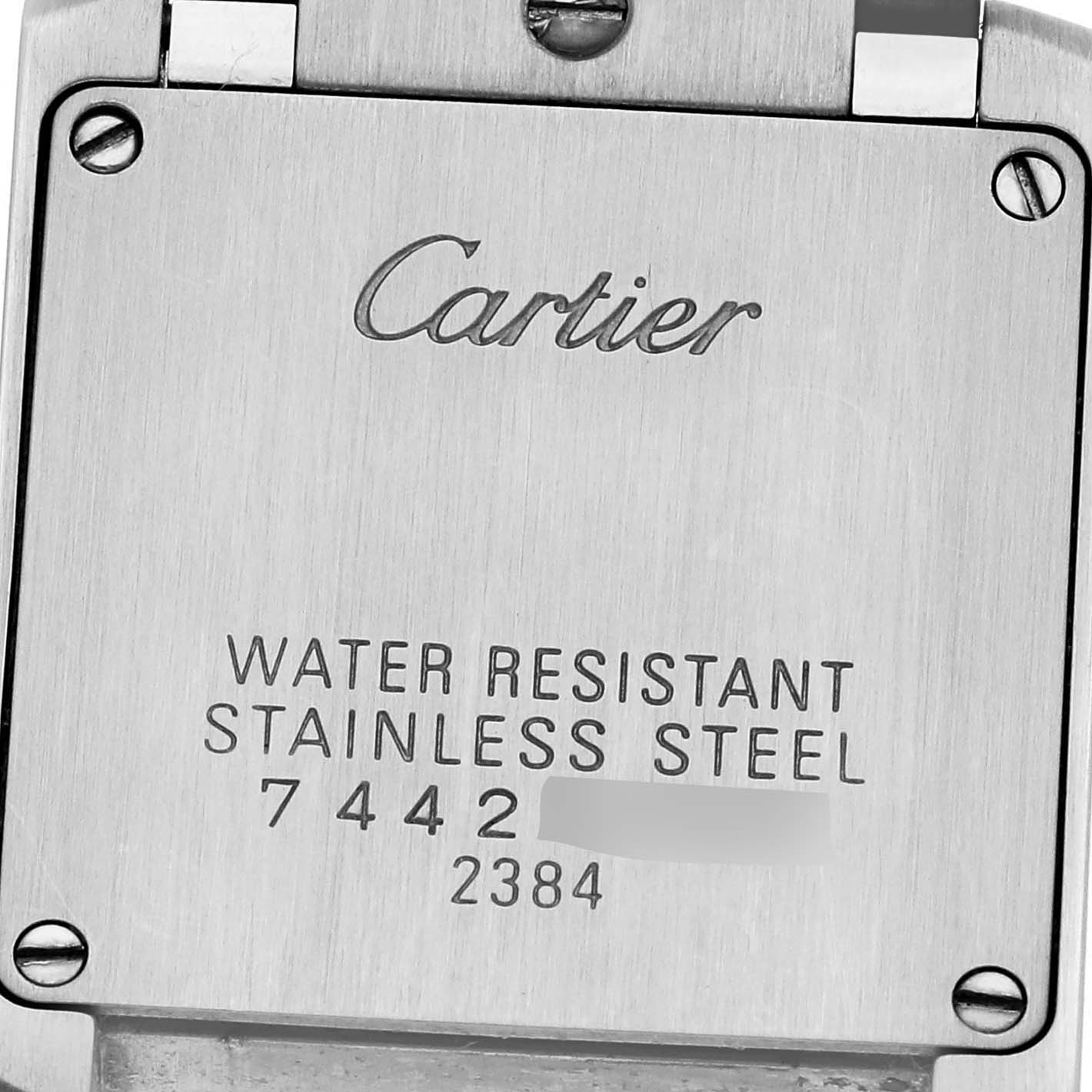 The image shows the back casing of the Cartier Tank Française watch, highlighting its water resistance and stainless steel build.