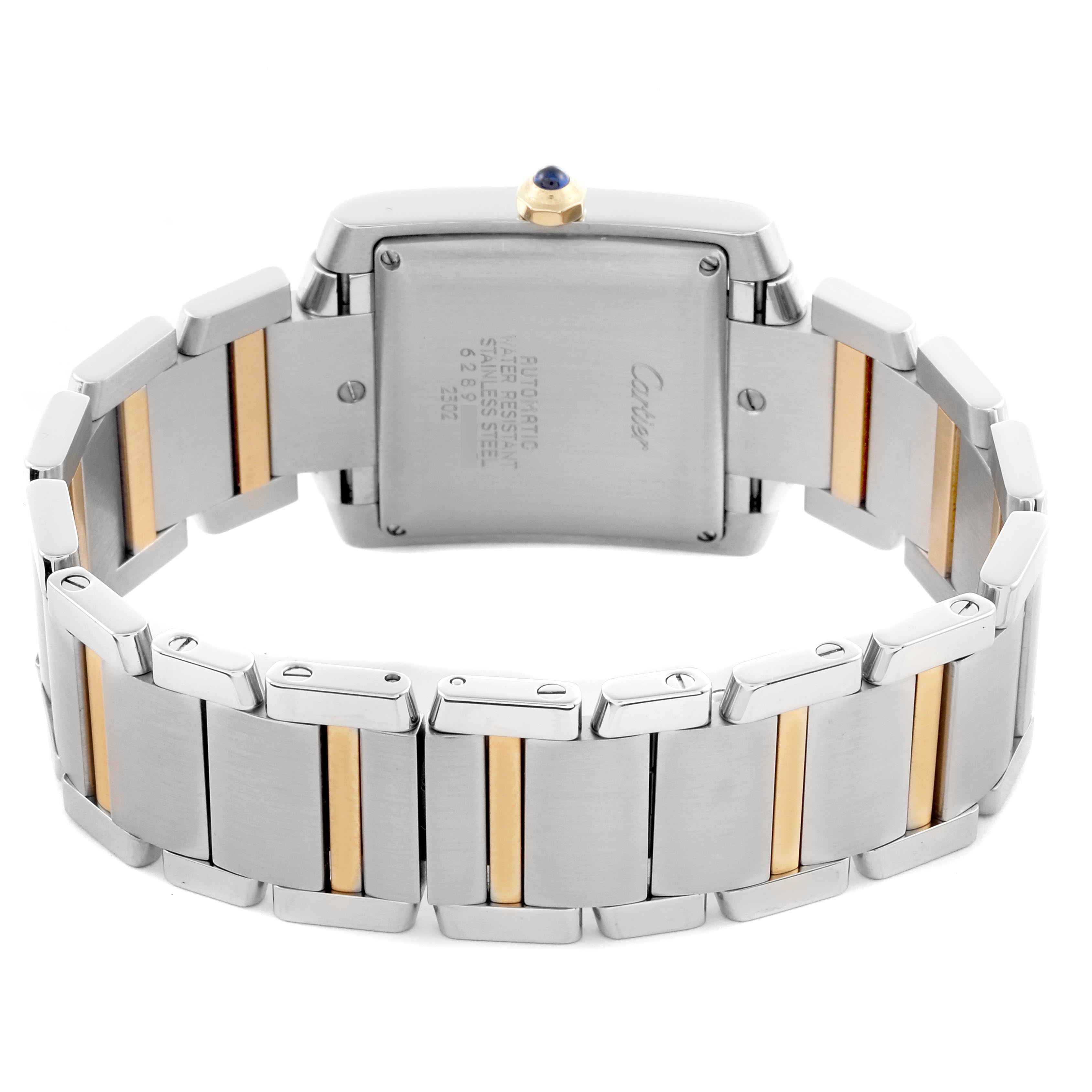 The Cartier Tank Française watch is shown from the back angle, highlighting the case and metal bracelet with gold accents.