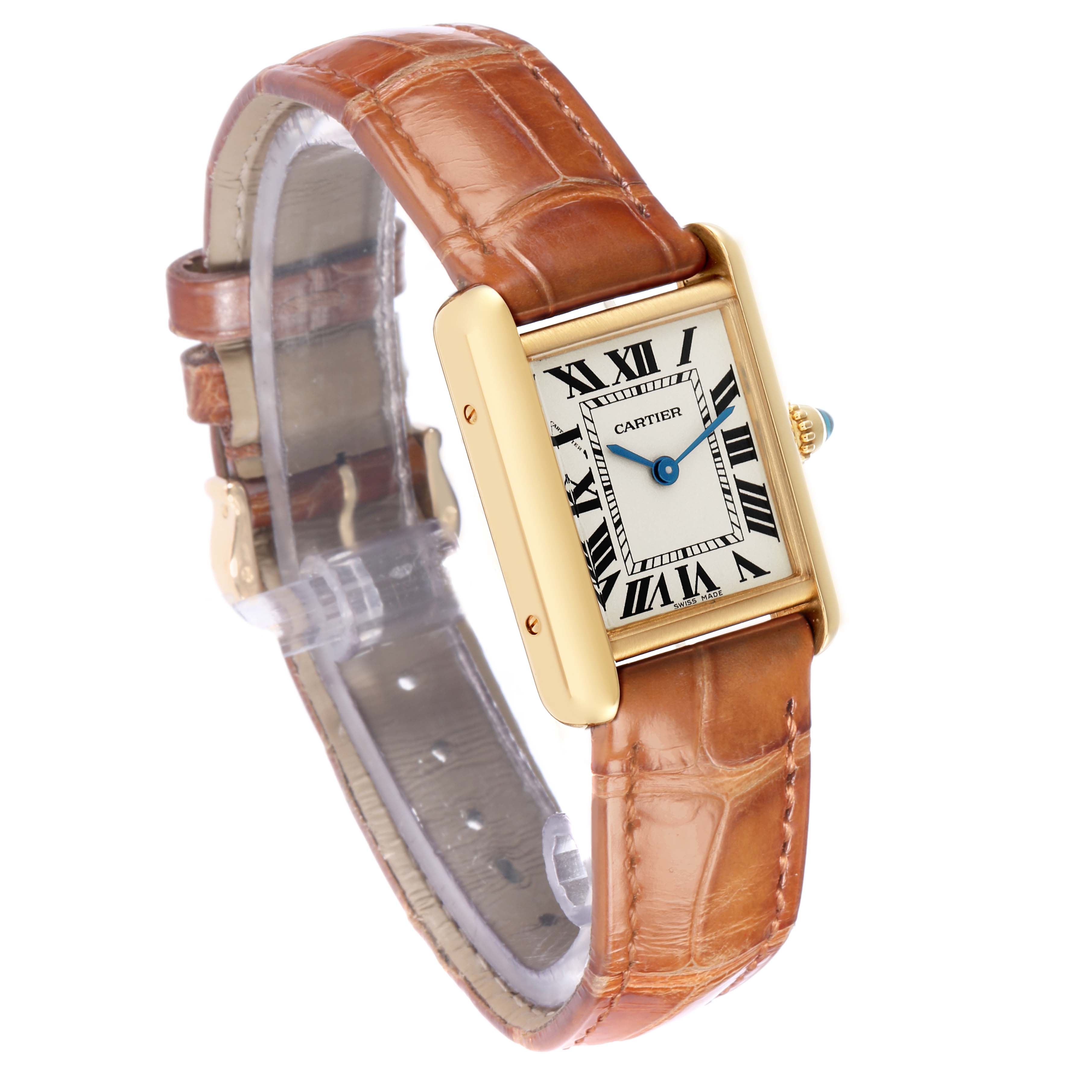 The Cartier Tank Louis W1529856 Women
s Yellow Gold Silver Dial watch is shown at a slight angle, displaying the face, gold case, crown with a gemstone, and brown leather strap.