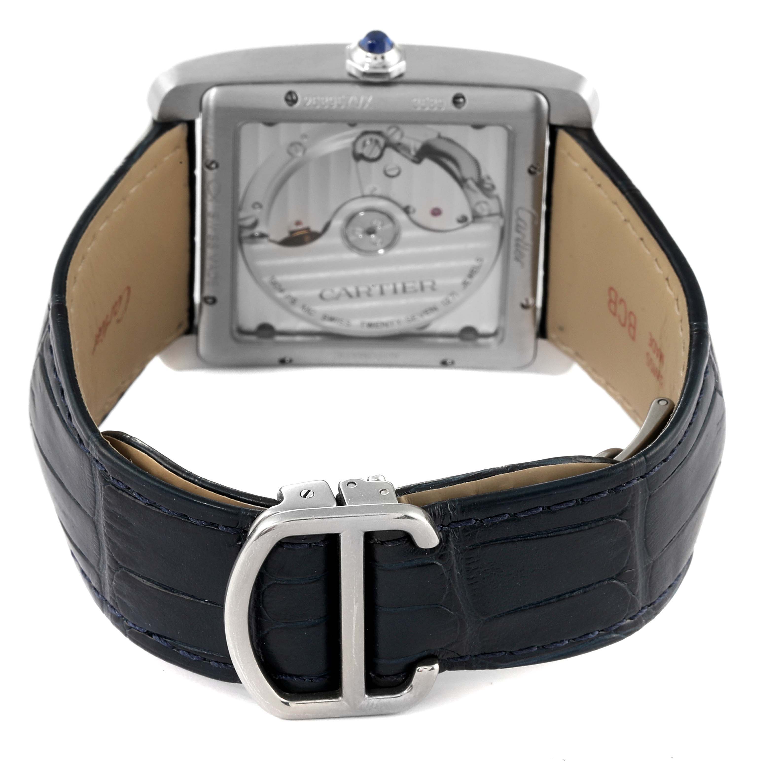 The image shows the back view of a Cartier Tank MC WSTA0010 Men's Stainless Steel Blue Dial WSTA0010 Men's Stainless Steel Blue Dial watch, displaying its movement and leather strap with buckle.