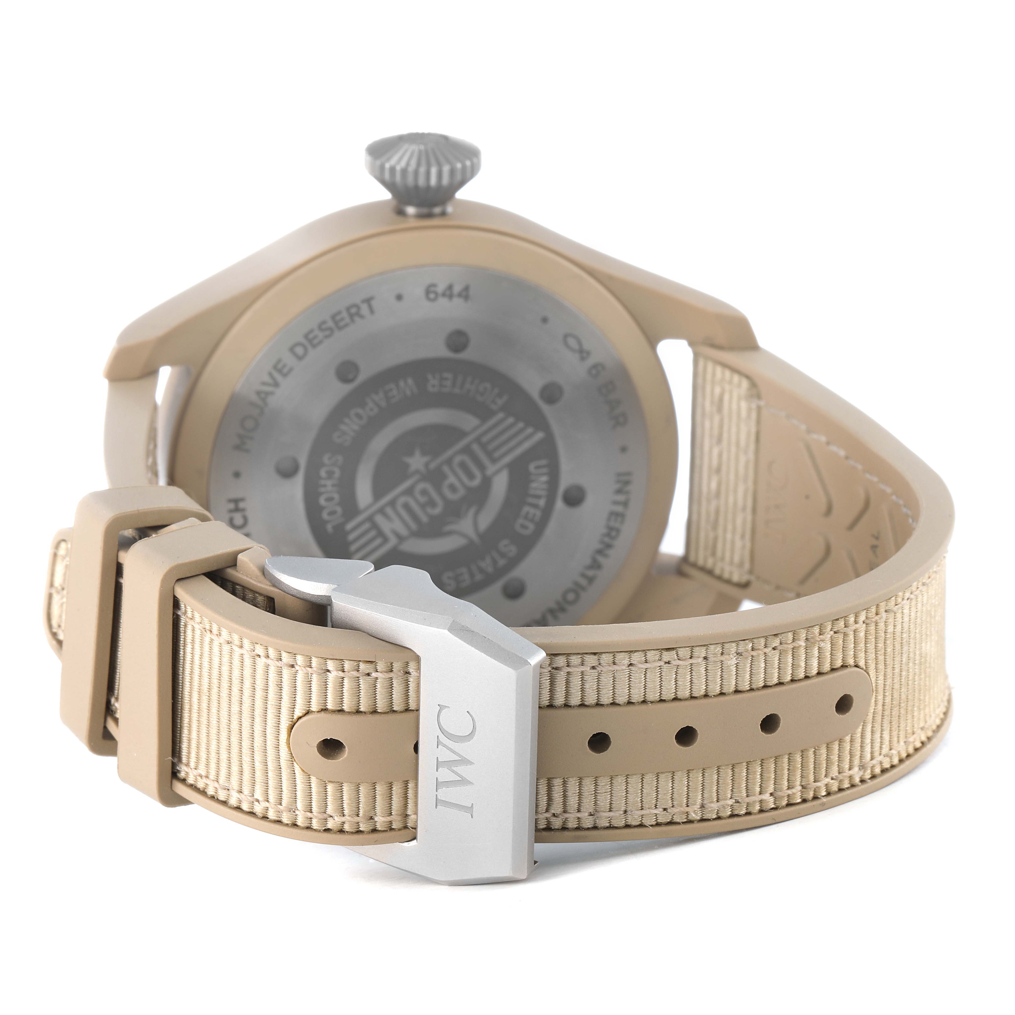 The IWC Pilot IW506003 Men's Ceramic Brown Dial watch is shown from the back, highlighting the case back, crown, and beige strap with a buckle.