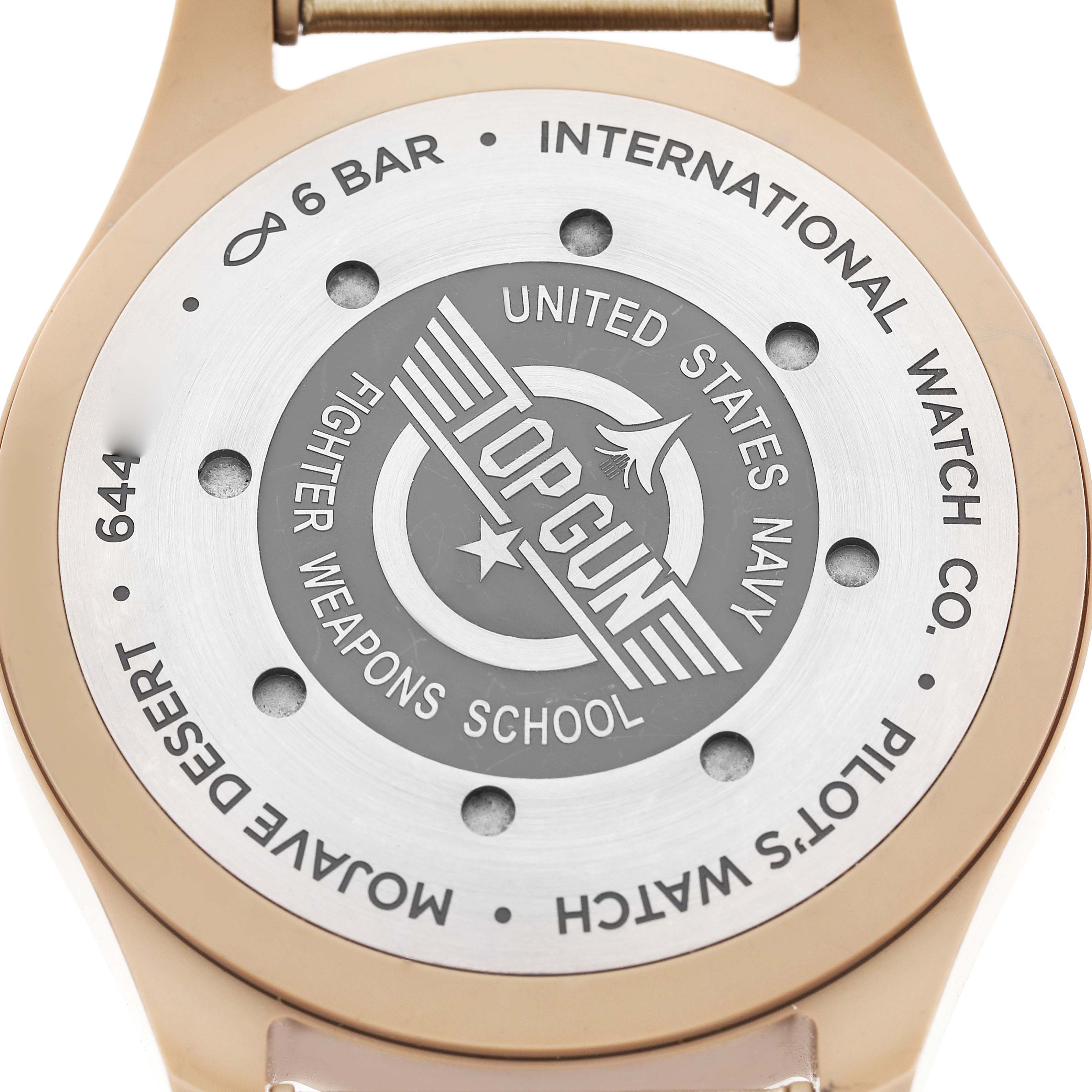 The image shows the back case of the IWC Pilot IW506003 Men's Ceramic Brown Dial model, featuring the Top Gun logo and specifications.