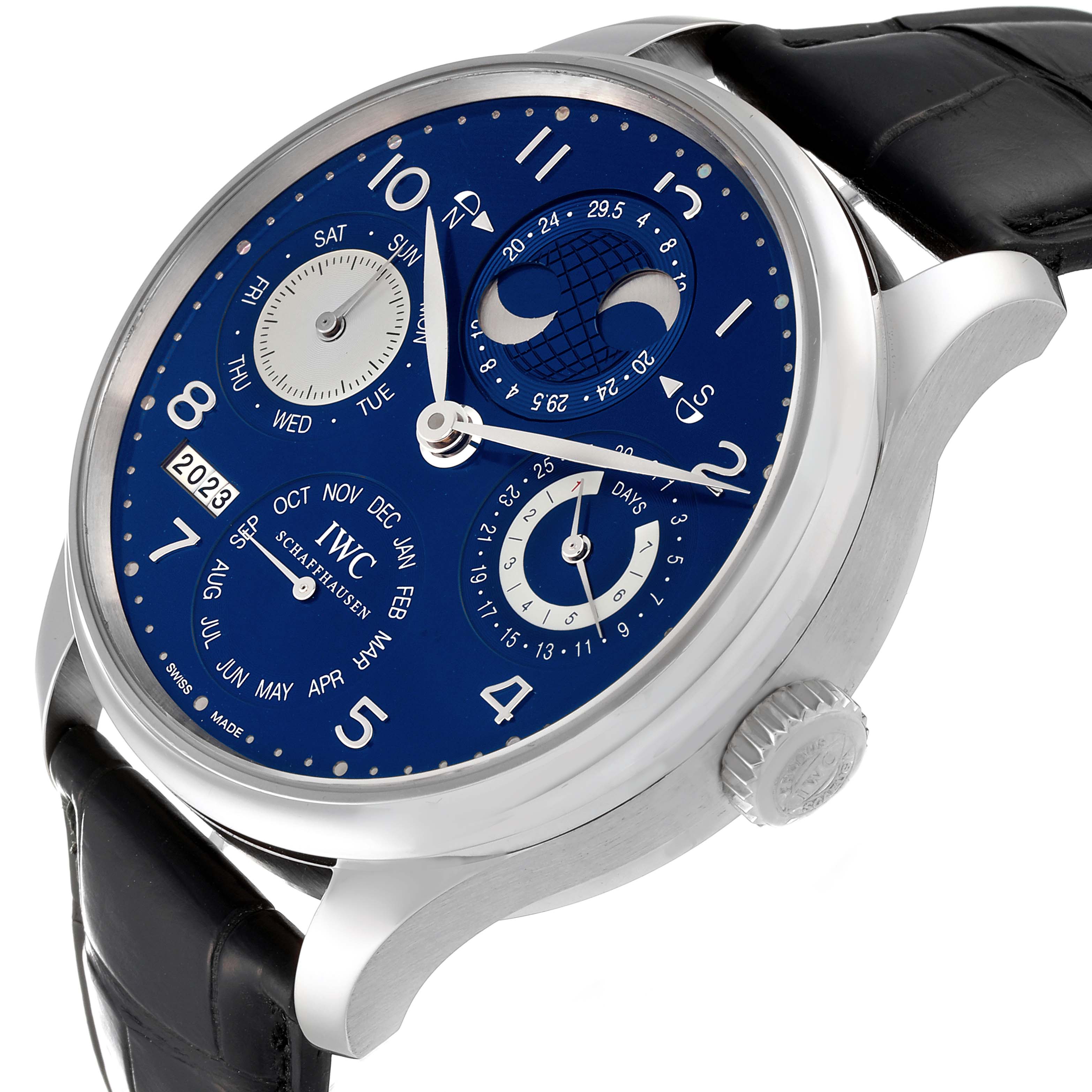 The IWC Portuguese IW503203 Men's White Gold Blue Dial IW503203 Men's White Gold Blue Dial model watch is shown from a three-quarter angle, displaying its blue dial, subdials, moon phase, and black leather strap.