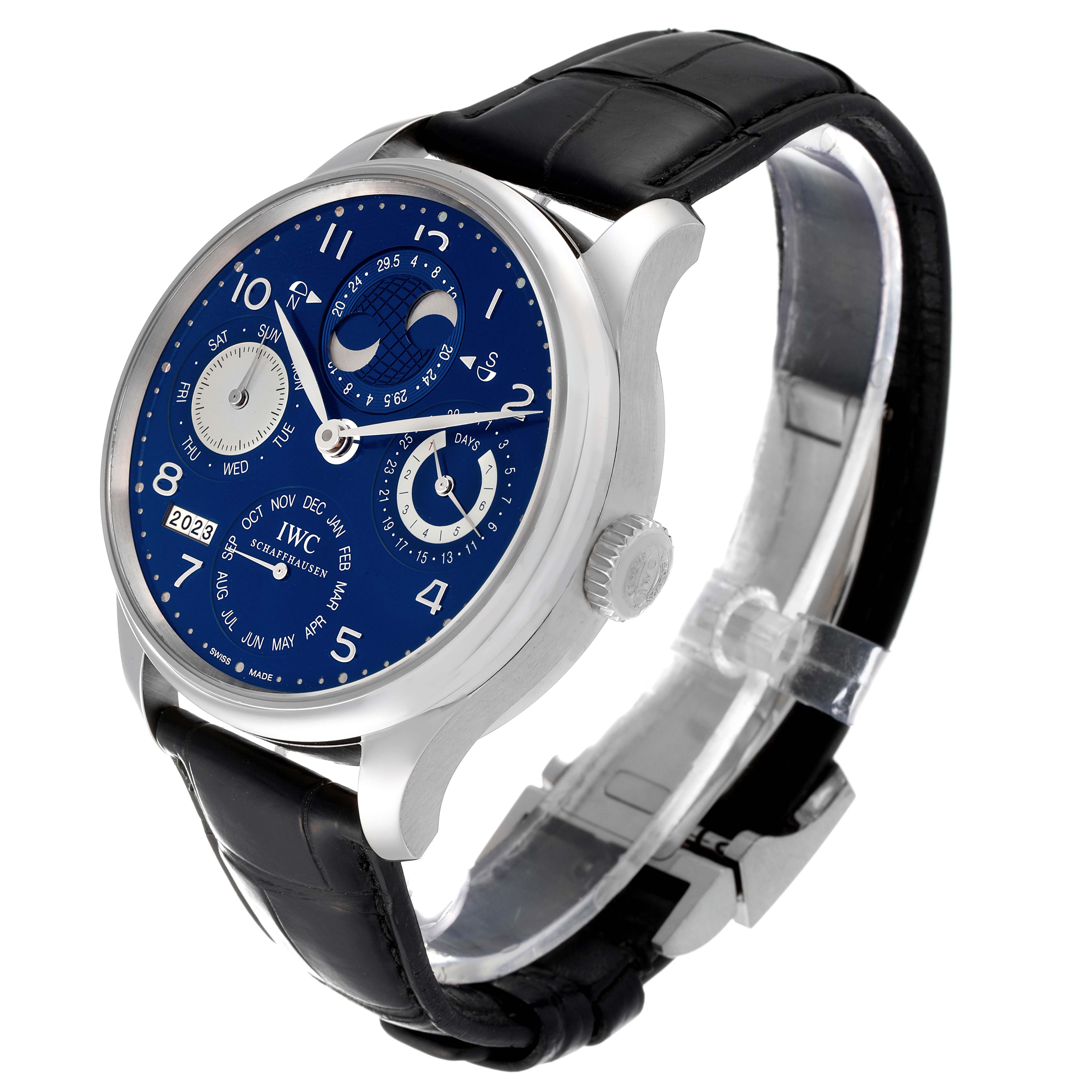 This IWC Portuguese IW503203 Men's White Gold Blue Dial IW503203 Men's White Gold Blue Dial model watch is shown from a side angle, highlighting the face, dial, crown, and black leather strap.