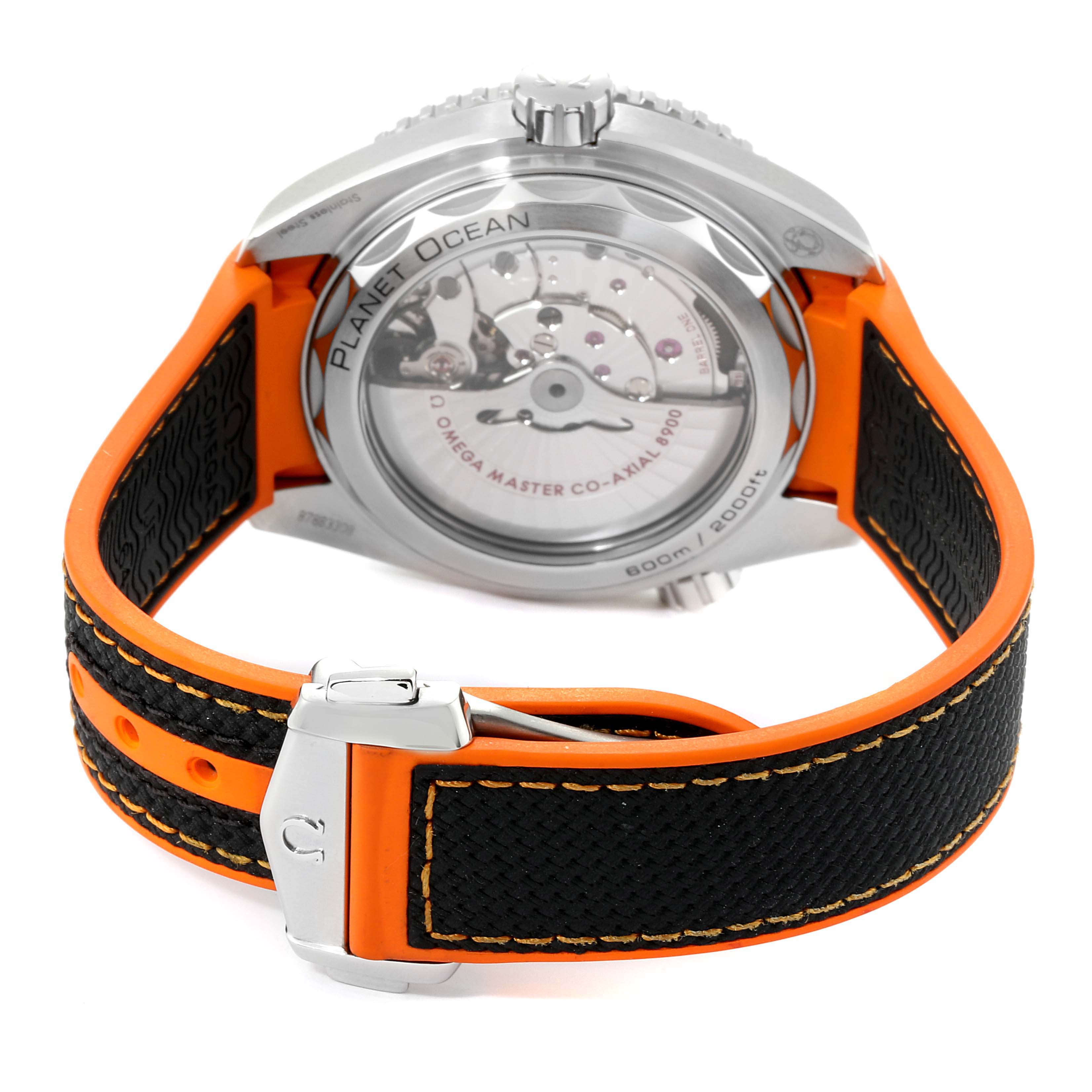 The Omega Planet Ocean 215.32.44.21.01.003 Men
s Stainless Steel Black Dial 215.32.44.21.01.003 Men
s Stainless Steel Black Dial watch is shown from the back, highlighting its case back and part of the strap with visible stitching.