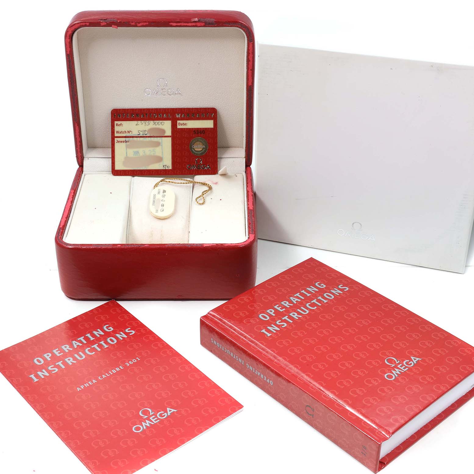 The image shows Omega Seamaster 2595.30.00 Men's Stainless Steel Silver Dial watch accessories, including a red box, warranty card, and operating instructions.