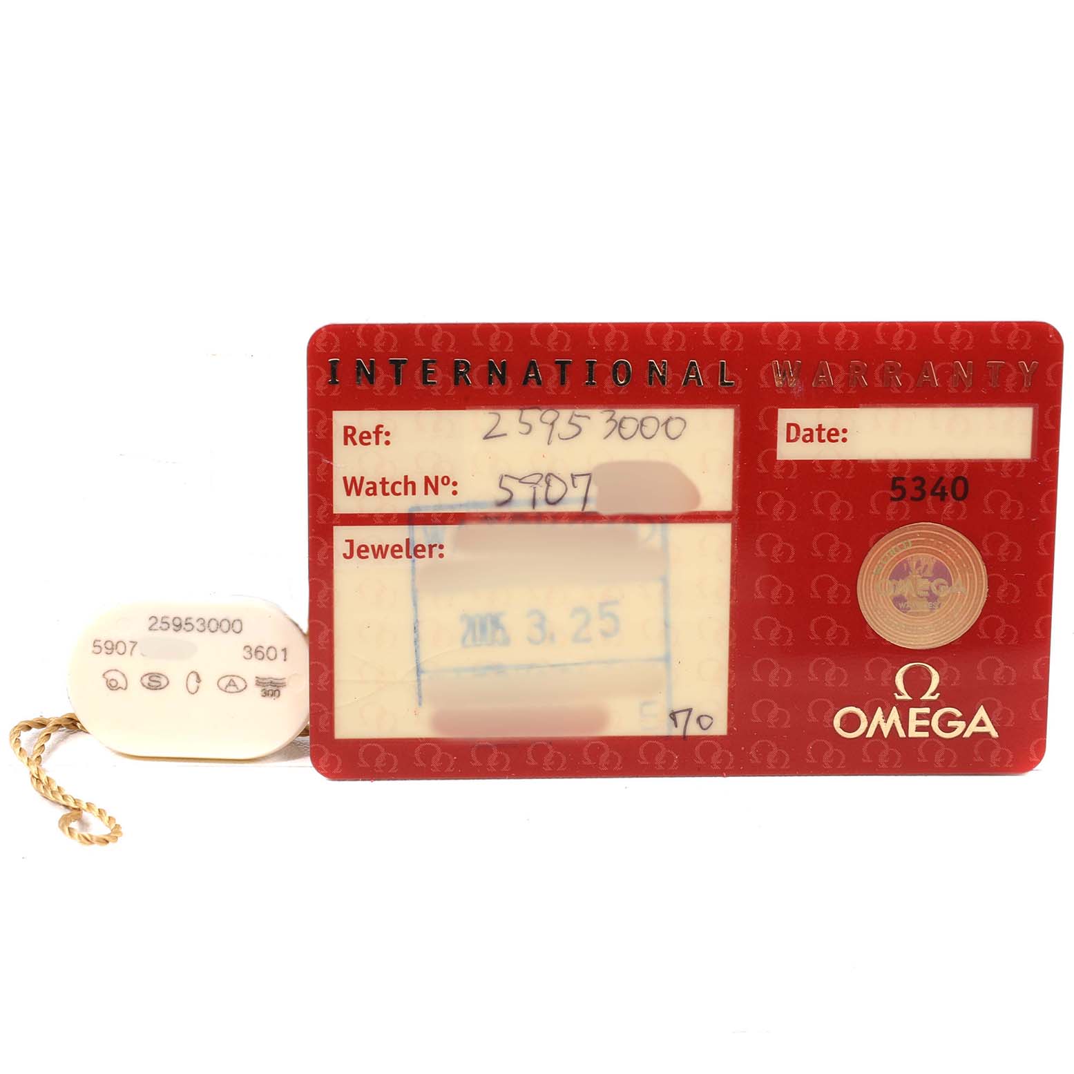 The image shows an Omega Seamaster 2595.30.00 Men's Stainless Steel Silver Dial warranty card and tag from a front view, displaying reference and serial numbers.