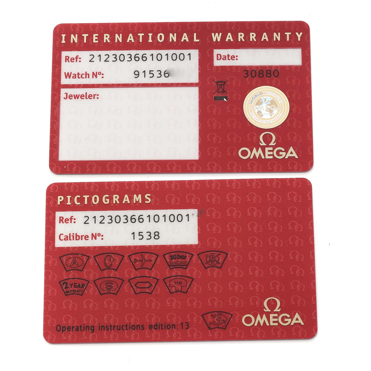 The image shows the International Warranty and Pictograms cards for the Omega Seamaster 212.30.36.61.01.001 Men
s Stainless Steel Black Dial watch model.