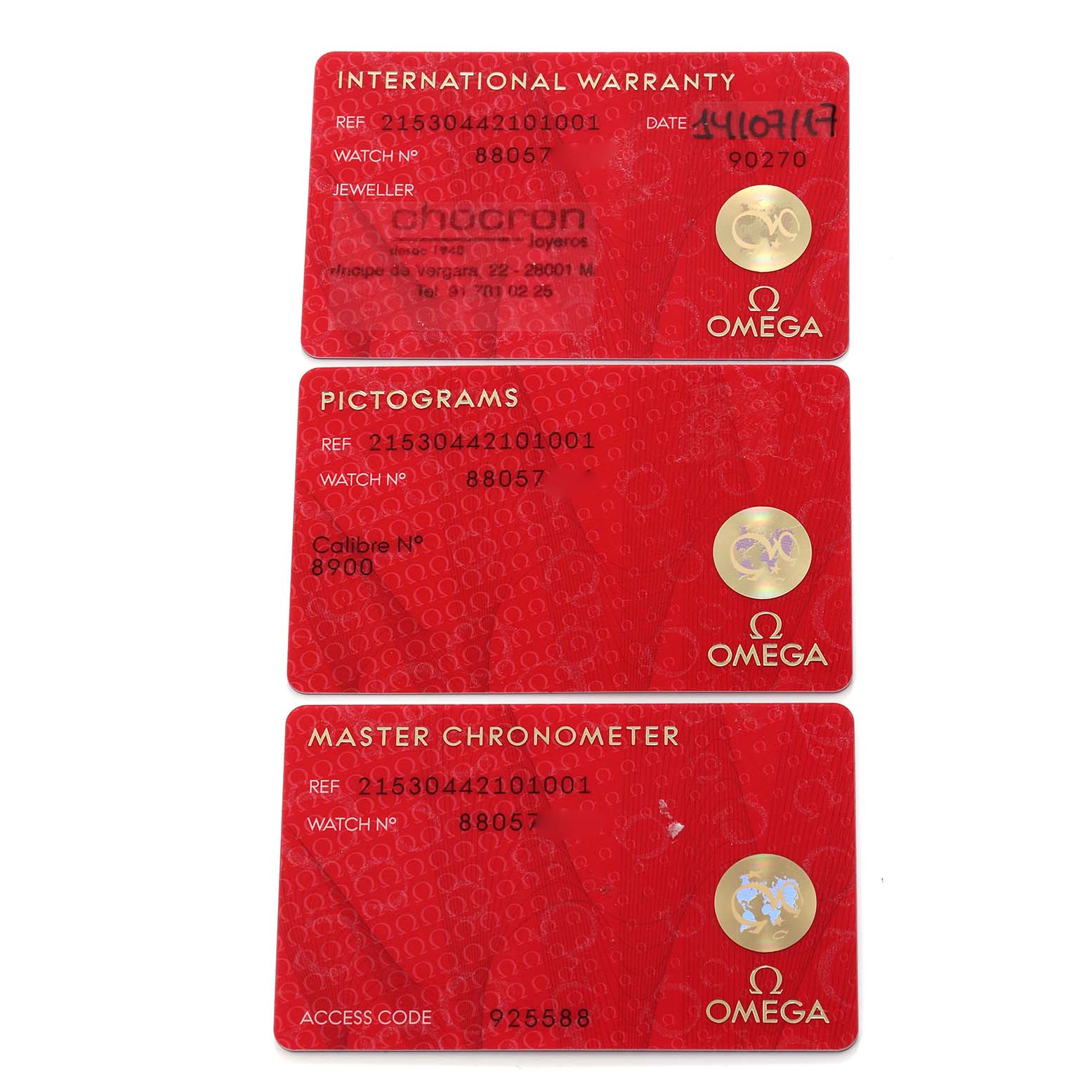 The image shows three Omega Seamaster 215.30.44.21.01.001 Men
s Stainless Steel Black Dial cards: International Warranty, Pictograms, and Master Chronometer, laid flat.