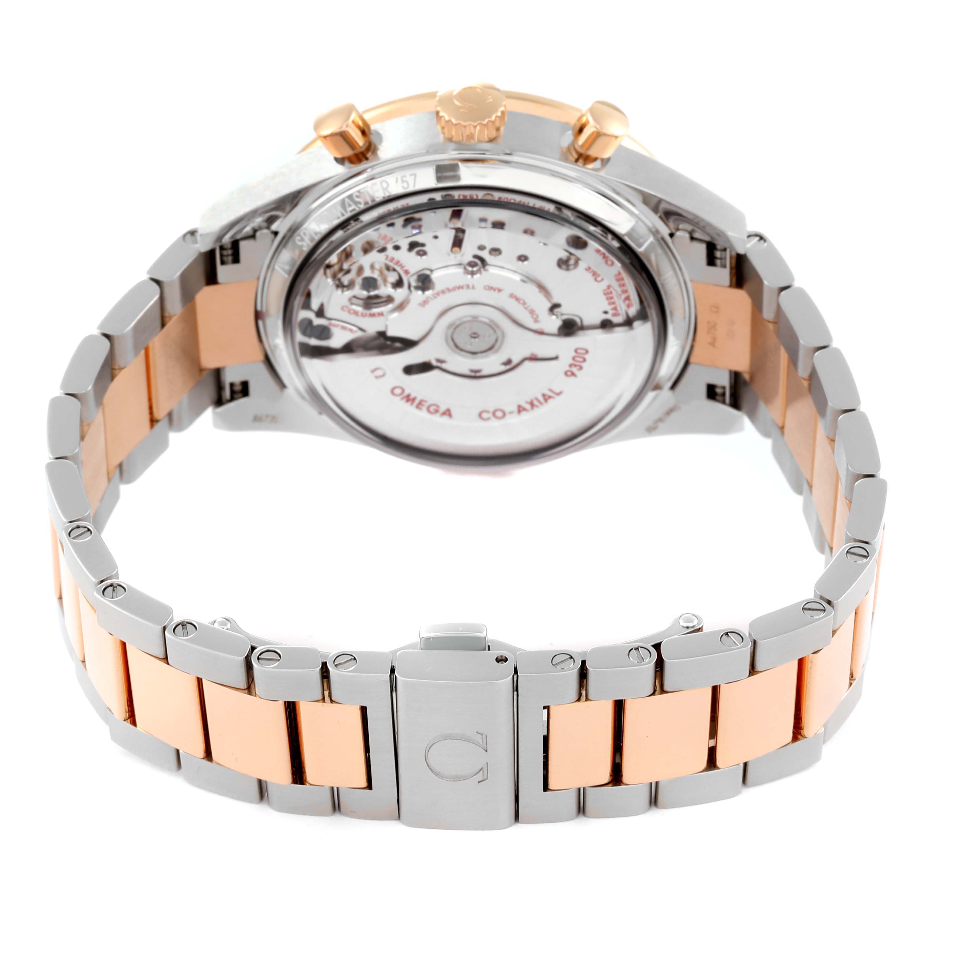 The image shows the back view of the Omega Speedmaster 331.20.42.51.01.002 Men's Steel and Gold (two tone) Black Dial 331.20.42.51.01.002 Men's Steel and Gold (two tone) Black Dial watch, highlighting its transparent case back and stainless steel and rose gold bracelet.