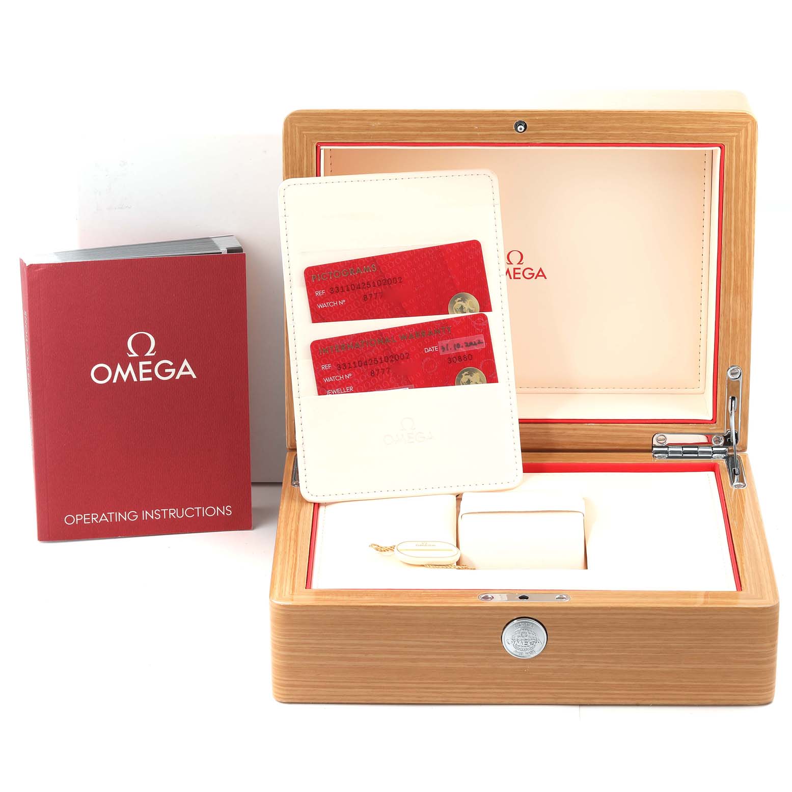 The image shows an Omega Speedmaster 331.10.42.51.02.002 Men
s Stainless Steel Silver Dial 331.10.42.51.02.002 Men
s Stainless Steel Silver Dial watch
s storage box, warranty cards, and operating instructions.