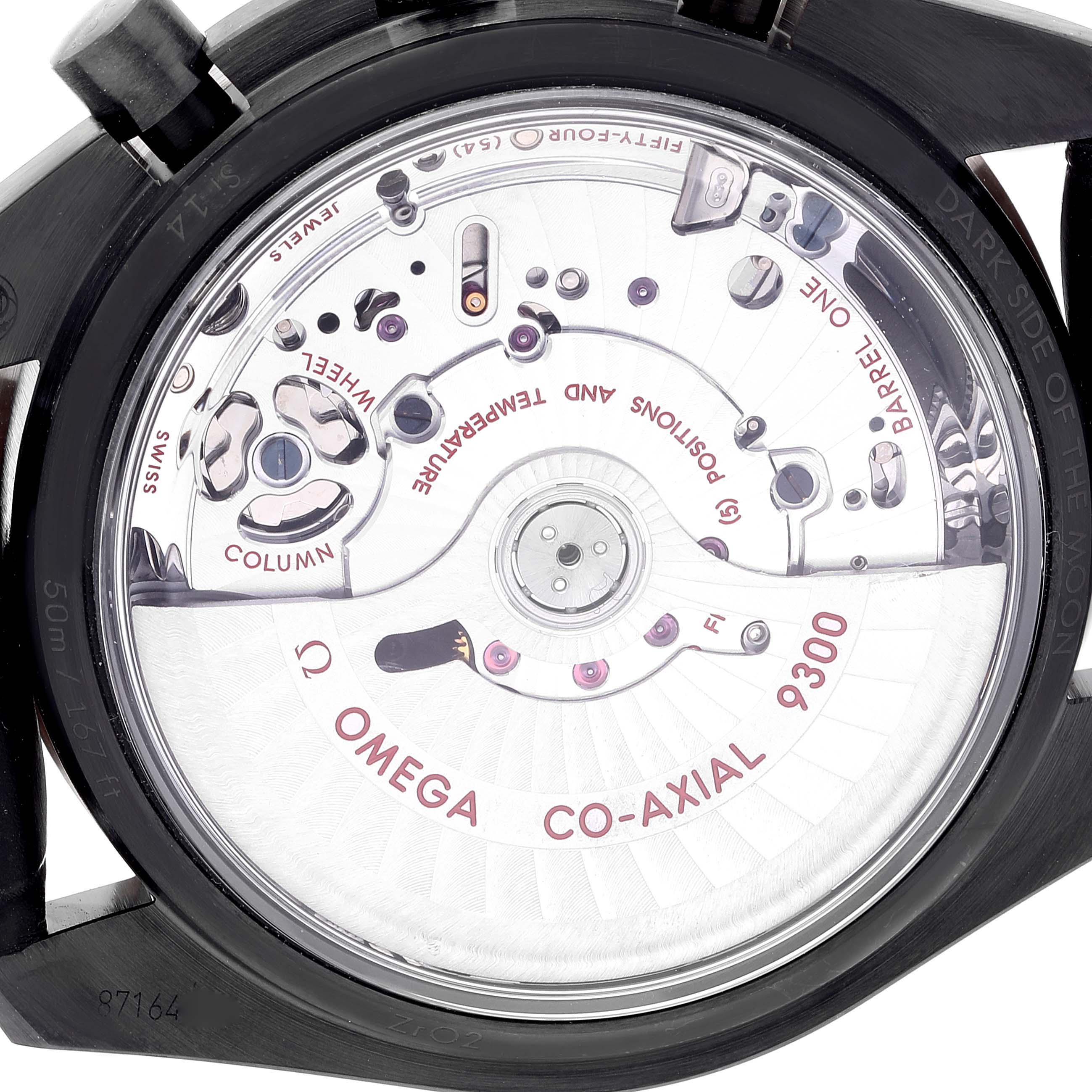 The image shows the back view of an Omega Speedmaster 311.63.44.51.06.001 Men's Ceramic Grey Dial 311.63.44.51.06.001 Men's Ceramic Grey Dial watch, revealing its Co-Axial 9300 movement and internal mechanics.