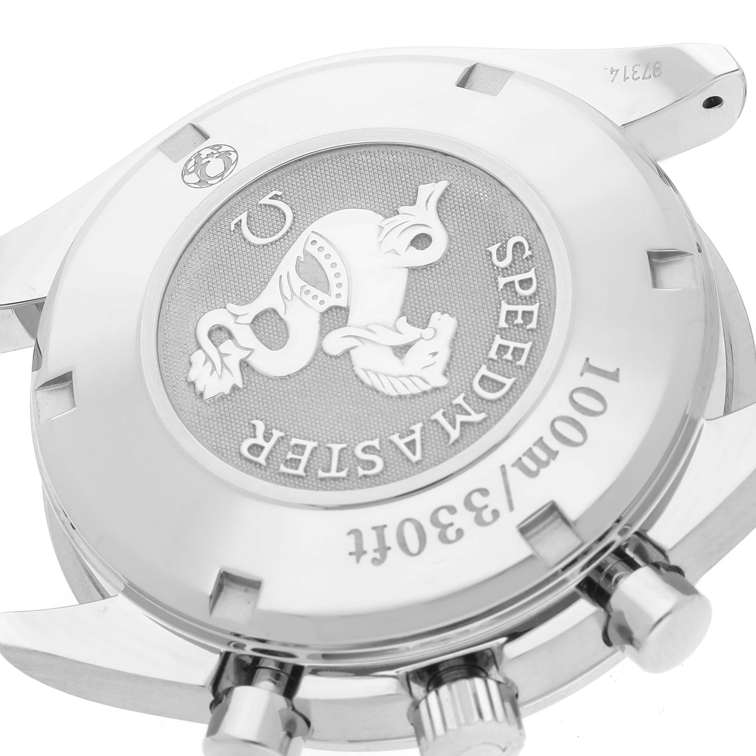 The image shows the case back and crown of the Omega Speedmaster 323.30.40.40.06.001 Men's Stainless Steel Grey Dial 323.30.40.40.06.001 Men's Stainless Steel Grey Dial watch from an angled, close-up perspective.