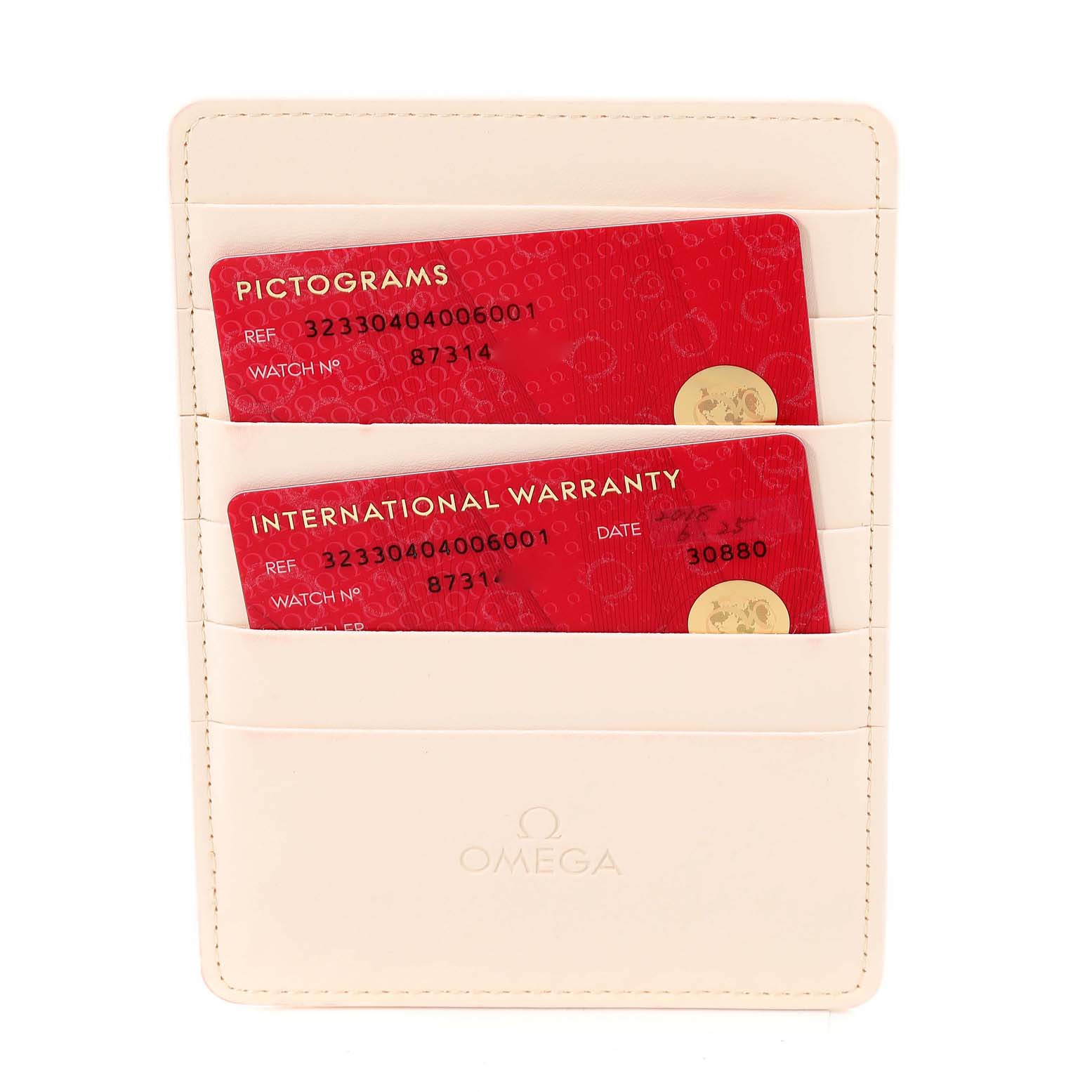 The image shows an Omega Speedmaster 323.30.40.40.06.001 Men's Stainless Steel Grey Dial 323.30.40.40.06.001 Men's Stainless Steel Grey Dial warranty card holder containing two red cards for pictograms and international warranty.