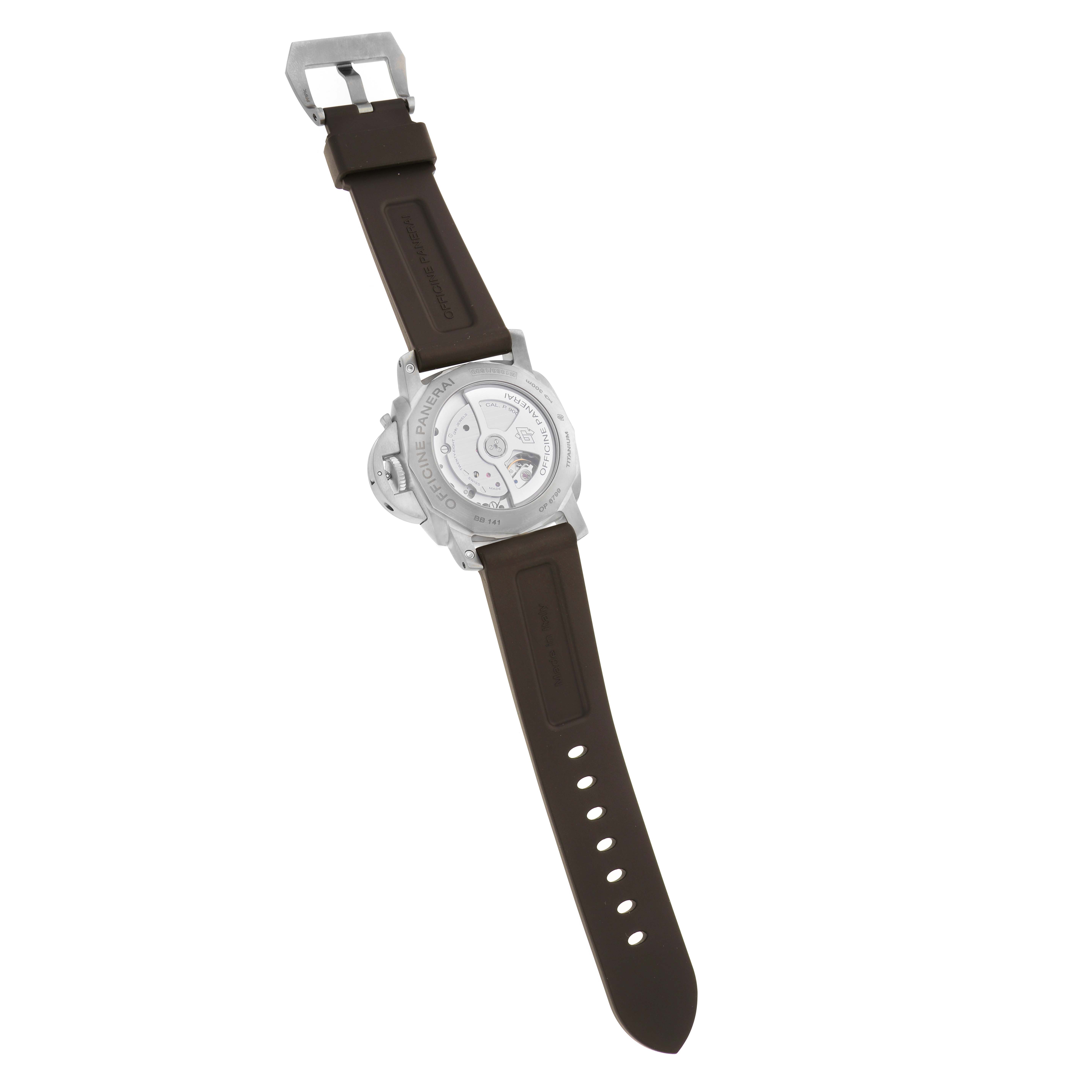 The image shows the back view of a Panerai Luminor PAM00351 Men
s Titanium Brown Dial watch, highlighting the case back, mechanism, and brown strap.