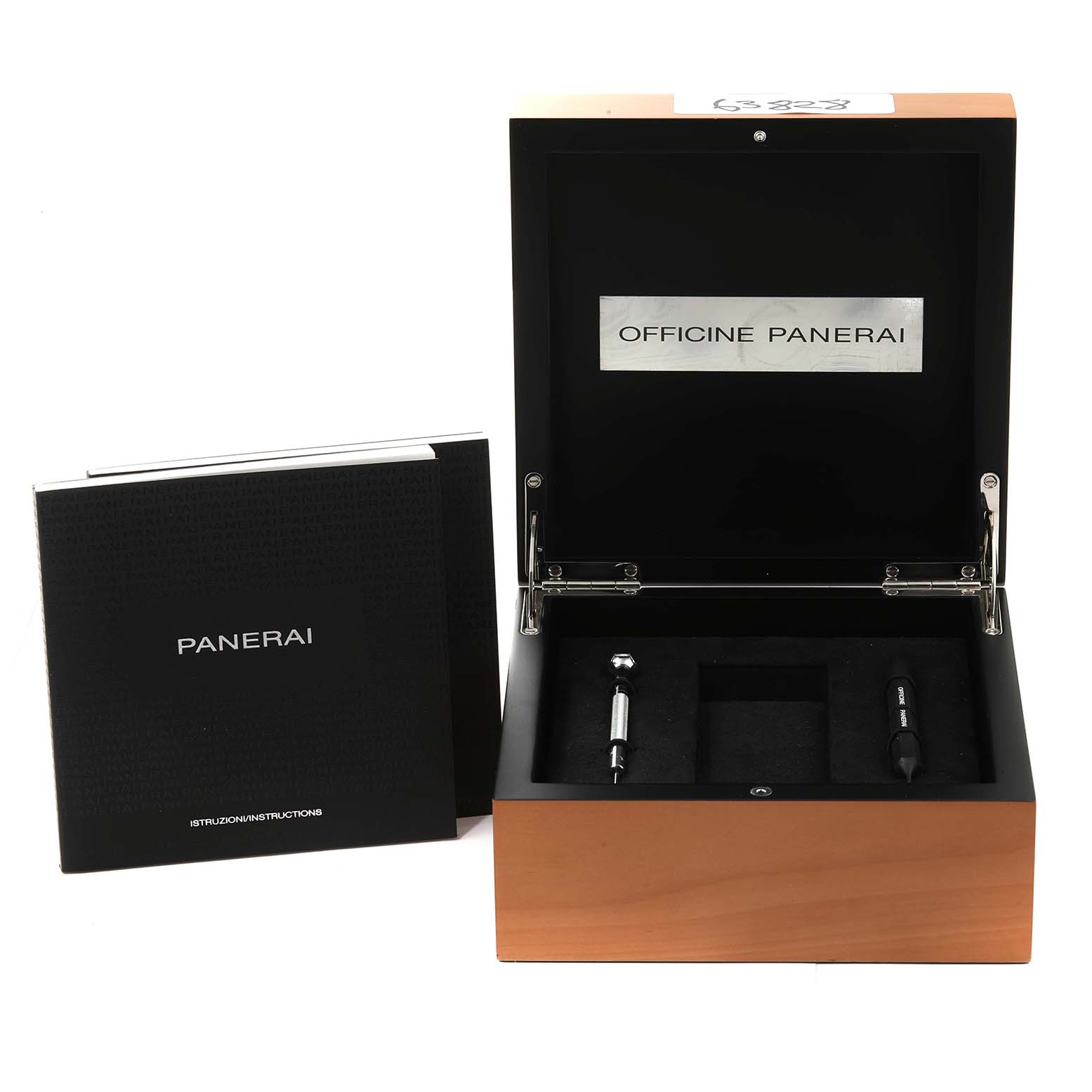 The image shows an open Panerai Luminor PAM00352 Men
s Titanium Brown Dial PAM00352 Men
s Titanium Brown Dial watch box with accessories and an instruction manual beside it.