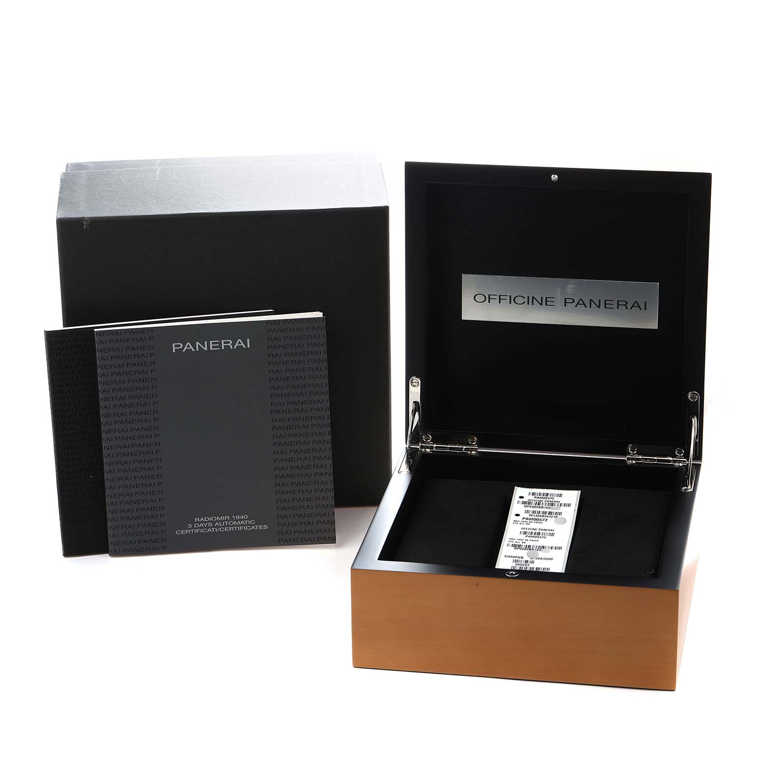 The image shows the packaging and documents of a Panerai Radiomir PAM00572 Men
s Stainless Steel Black Dial watch, with an open wooden box and manuals displayed.