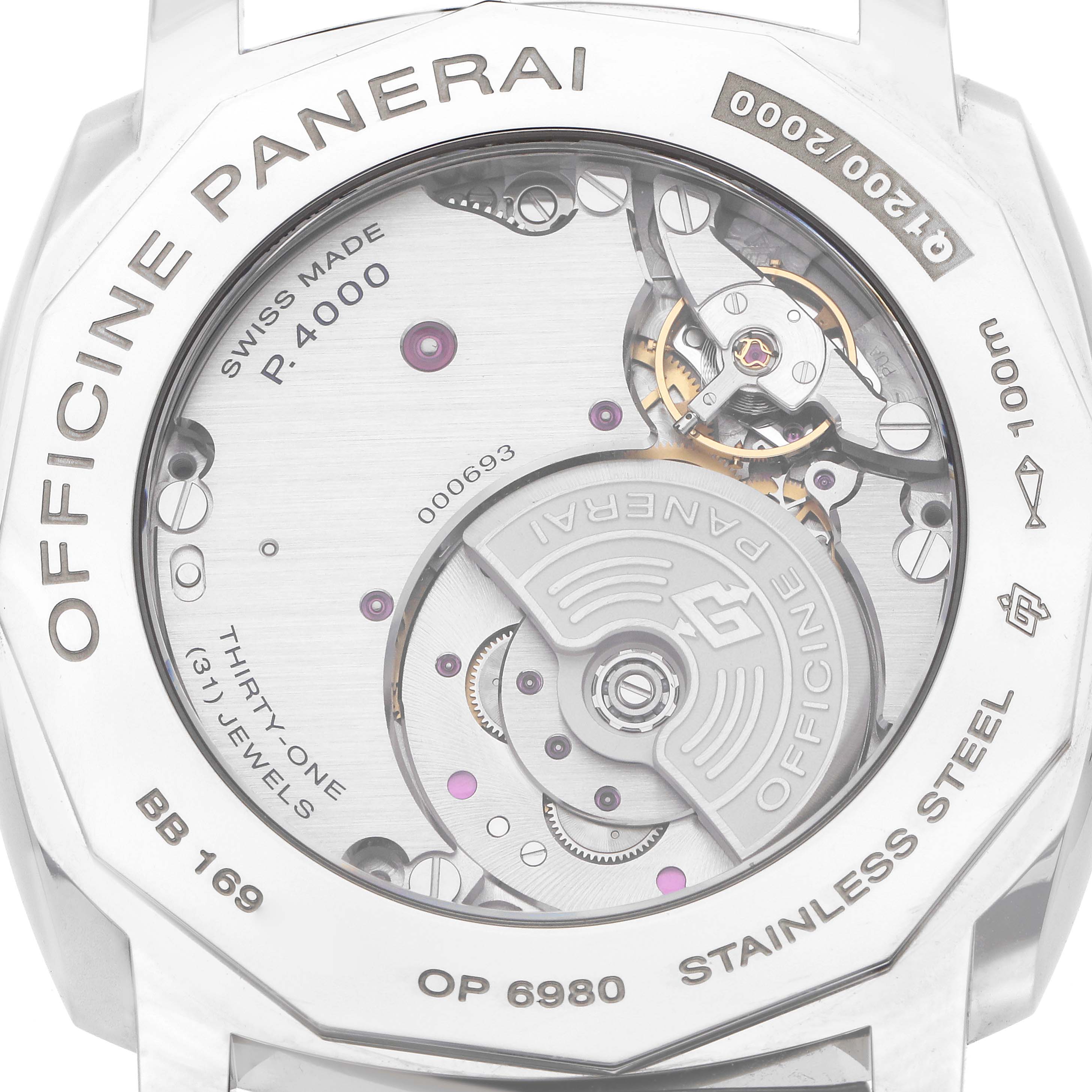 The image shows the back view of a Panerai Radiomir PAM00572 Men
s Stainless Steel Black Dial watch, highlighting its movement and internal mechanics.