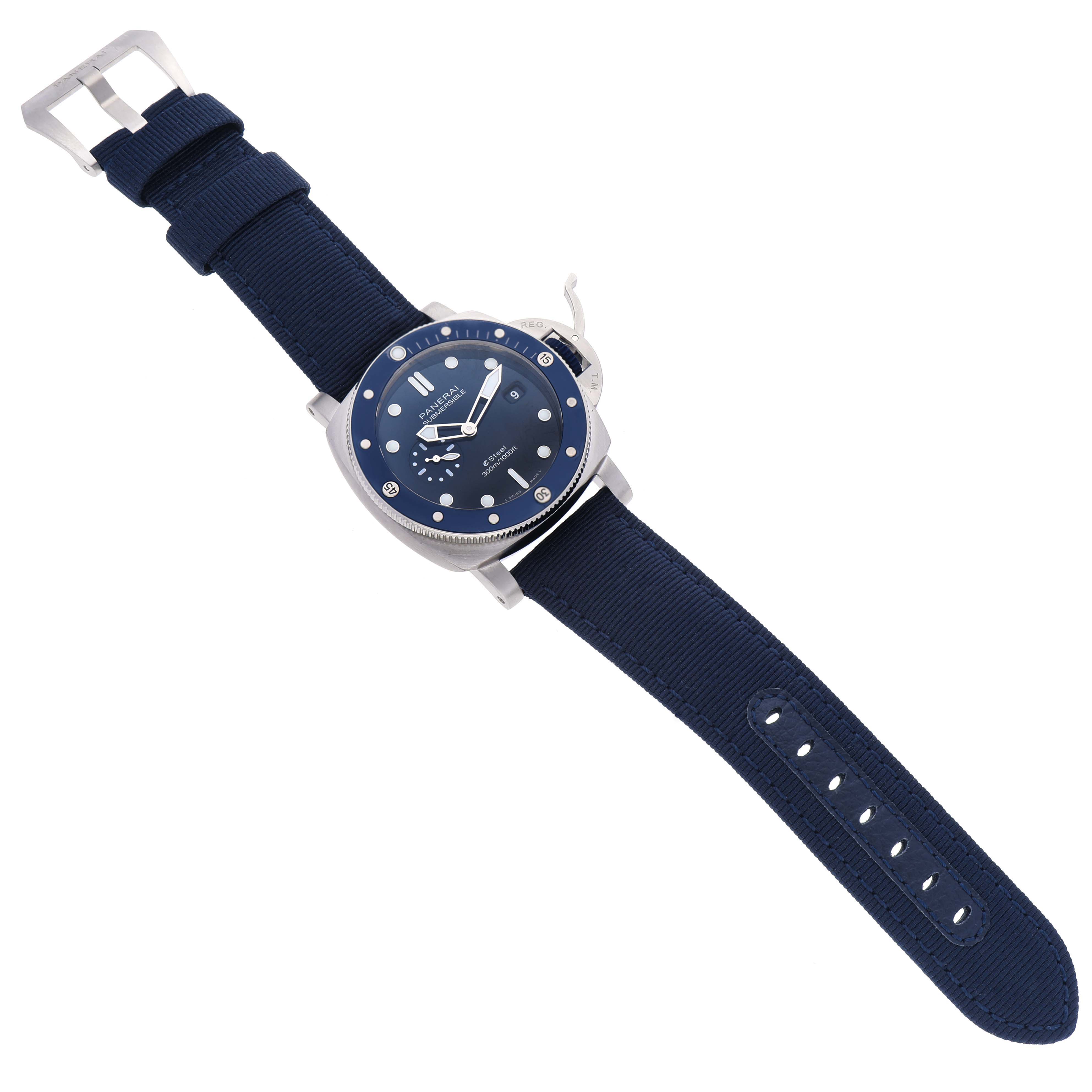 The image shows a top-down view of a Panerai Submersible PAM01289 Men's Stainless Steel Blue Dial PAM01289 Men's Stainless Steel Blue Dial watch with a blue strap and blue dial.