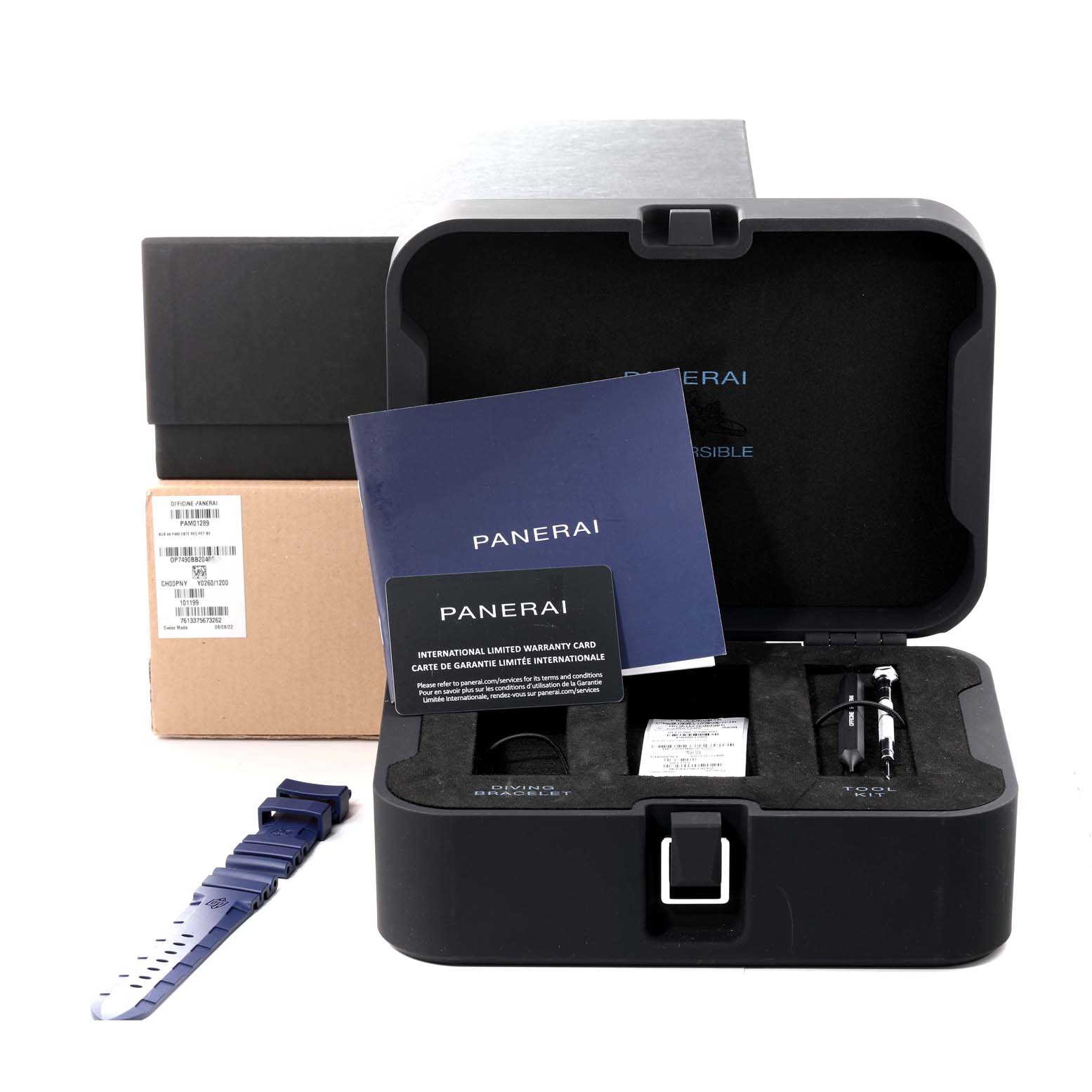 The image shows the Panerai Submersible PAM01289 Men's Stainless Steel Blue Dial PAM01289 Men's Stainless Steel Blue Dial watch box, warranty cards, a blue replacement strap, and various tools from a front angle.
