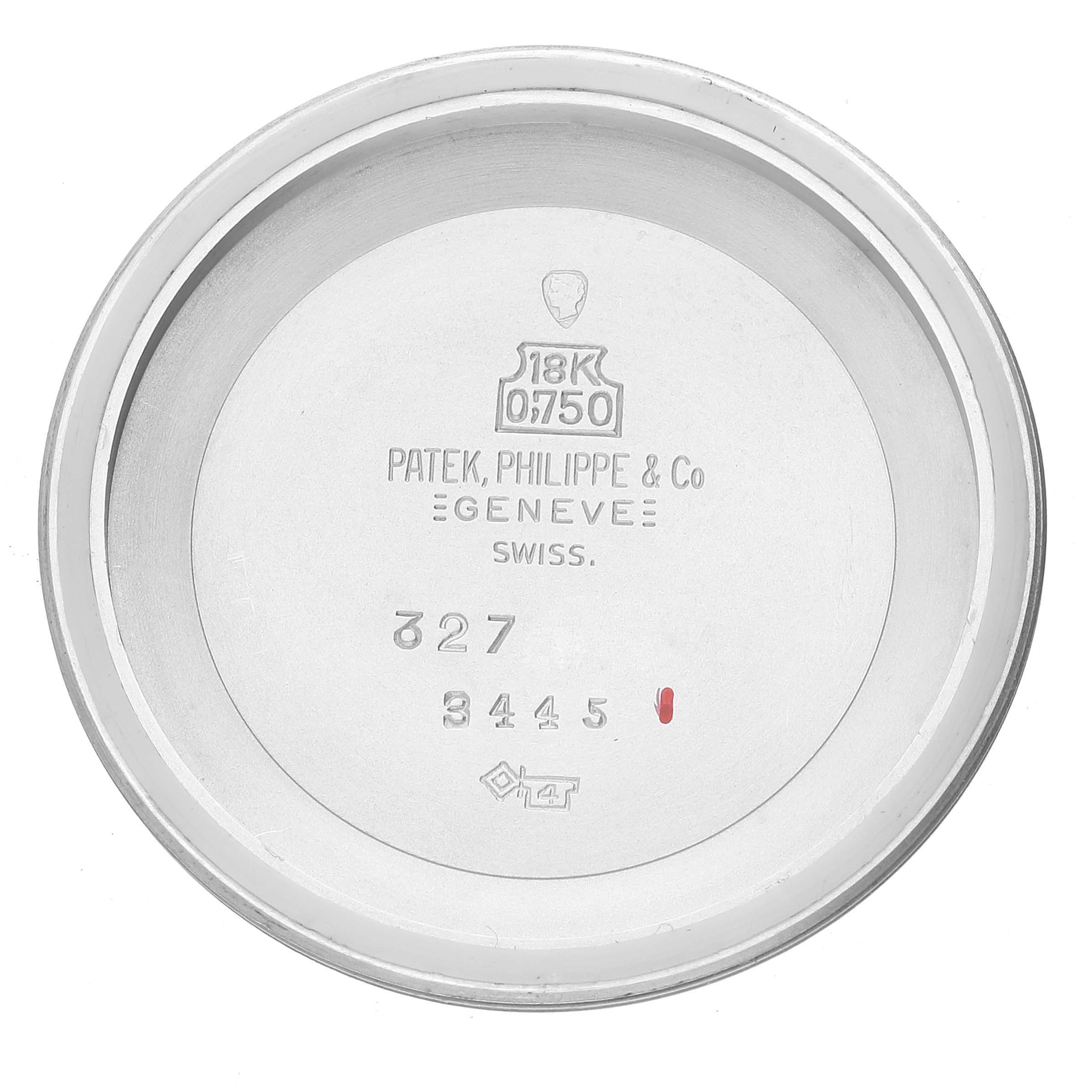 This image shows the back cover of a Vintage Patek Philippe watch with engravings indicating its specifications.