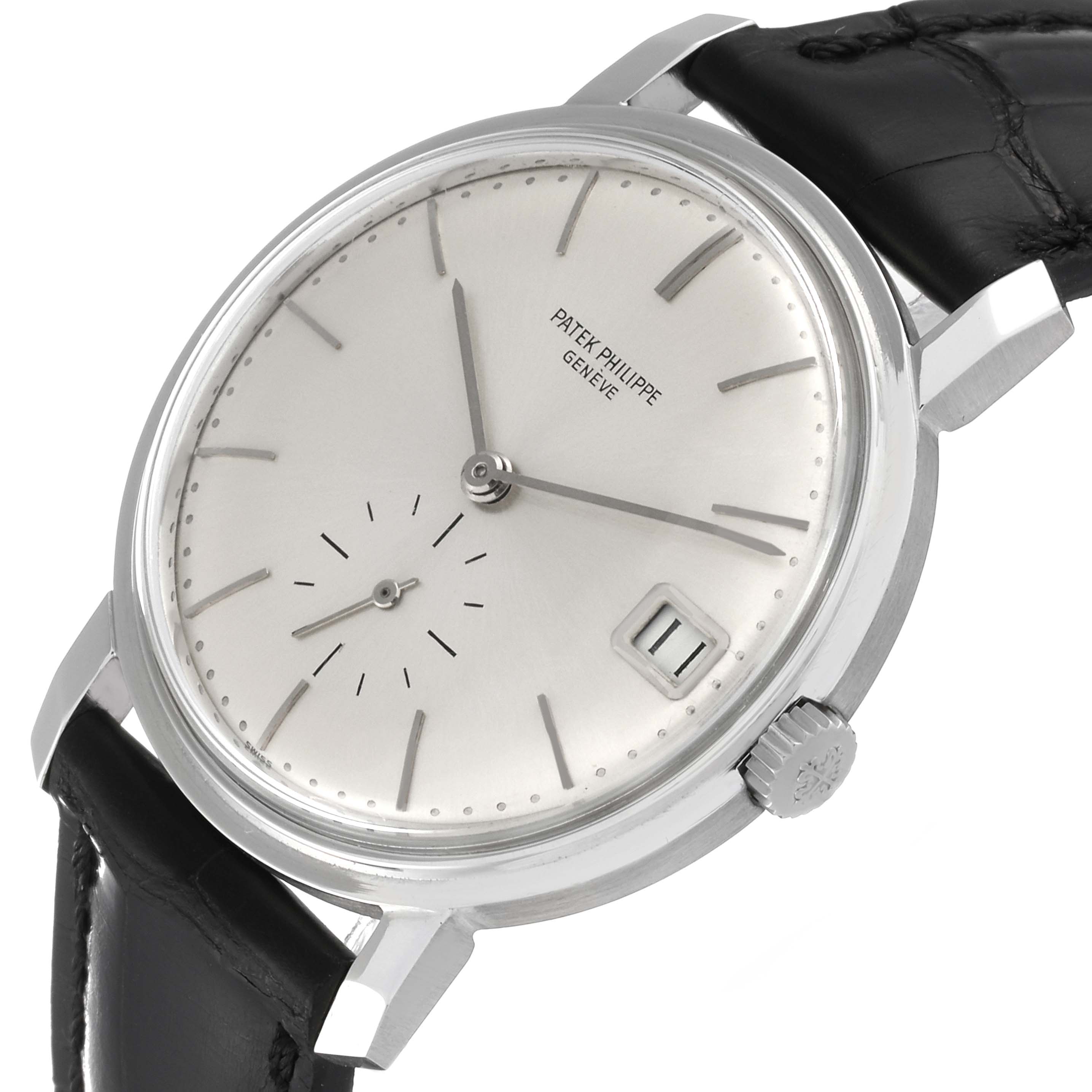 This image shows a Patek Philippe Vintage model watch angled to display the dial, case, crown, and part of the leather strap.